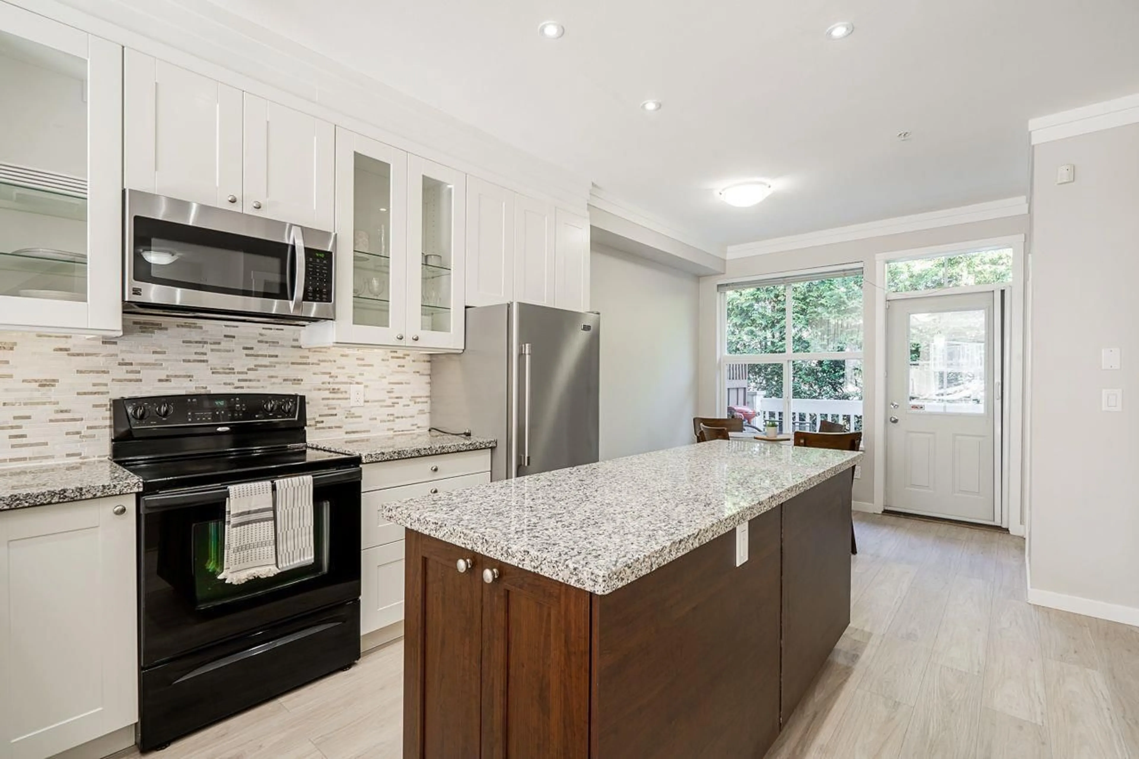 Open concept kitchen, ceramic/tile floor for 71 - 20460 66, Langley British Columbia V2Y3B6