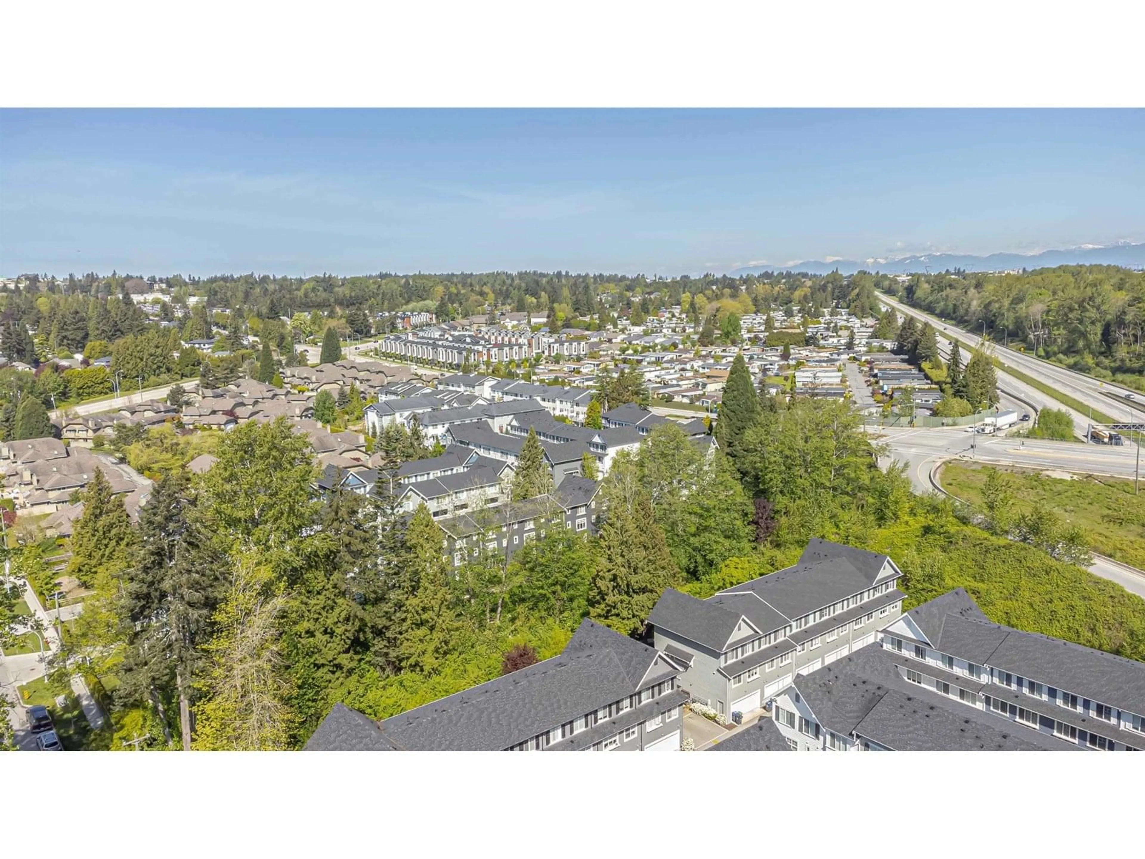 A pic from outside/outdoor area/front of a property/back of a property/a pic from drone, unknown for 16373 15, Surrey British Columbia V4A1L4