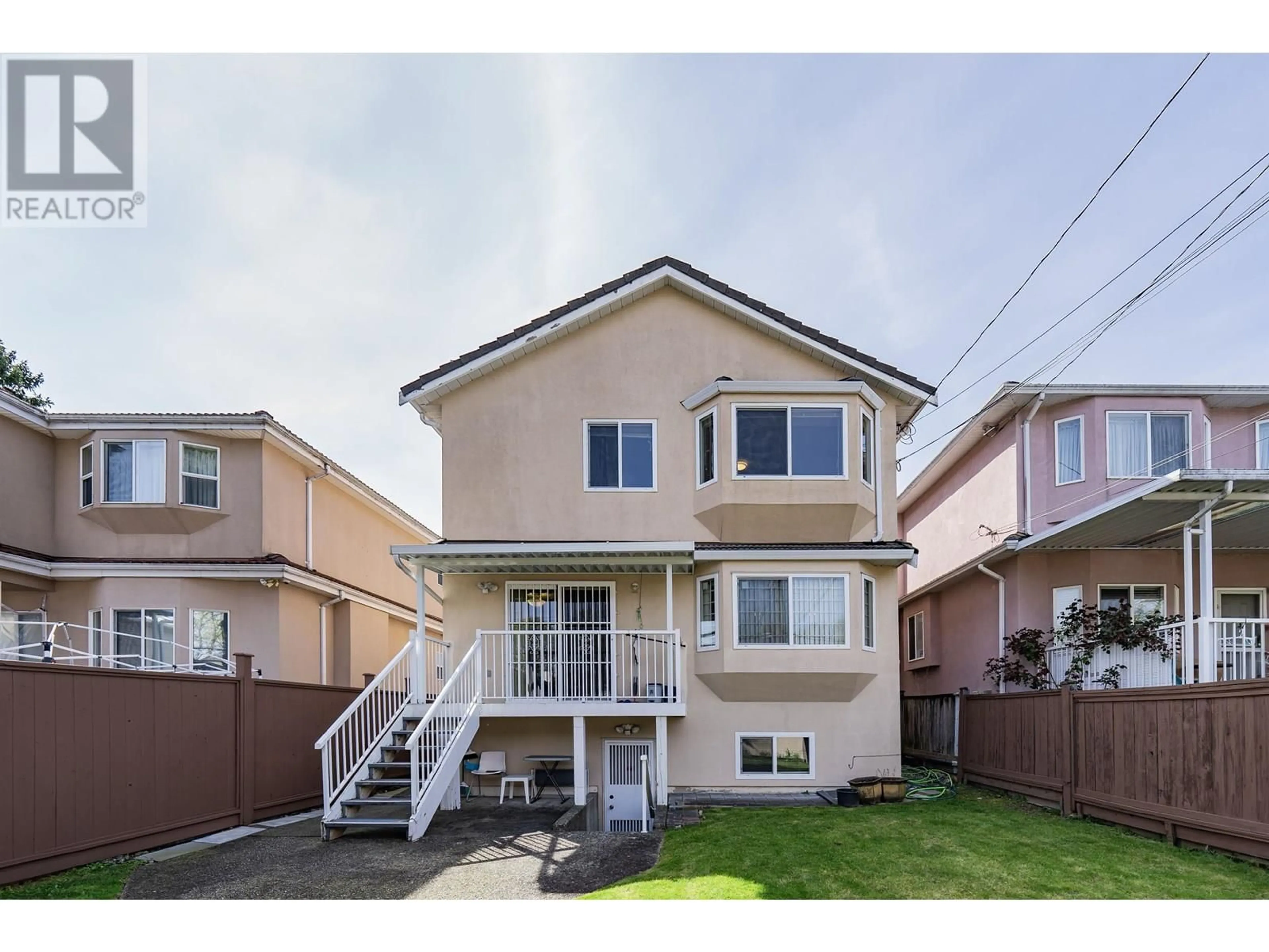 Home with vinyl exterior material, street for 8056 MONTCALM STREET, Vancouver British Columbia V6P4P5