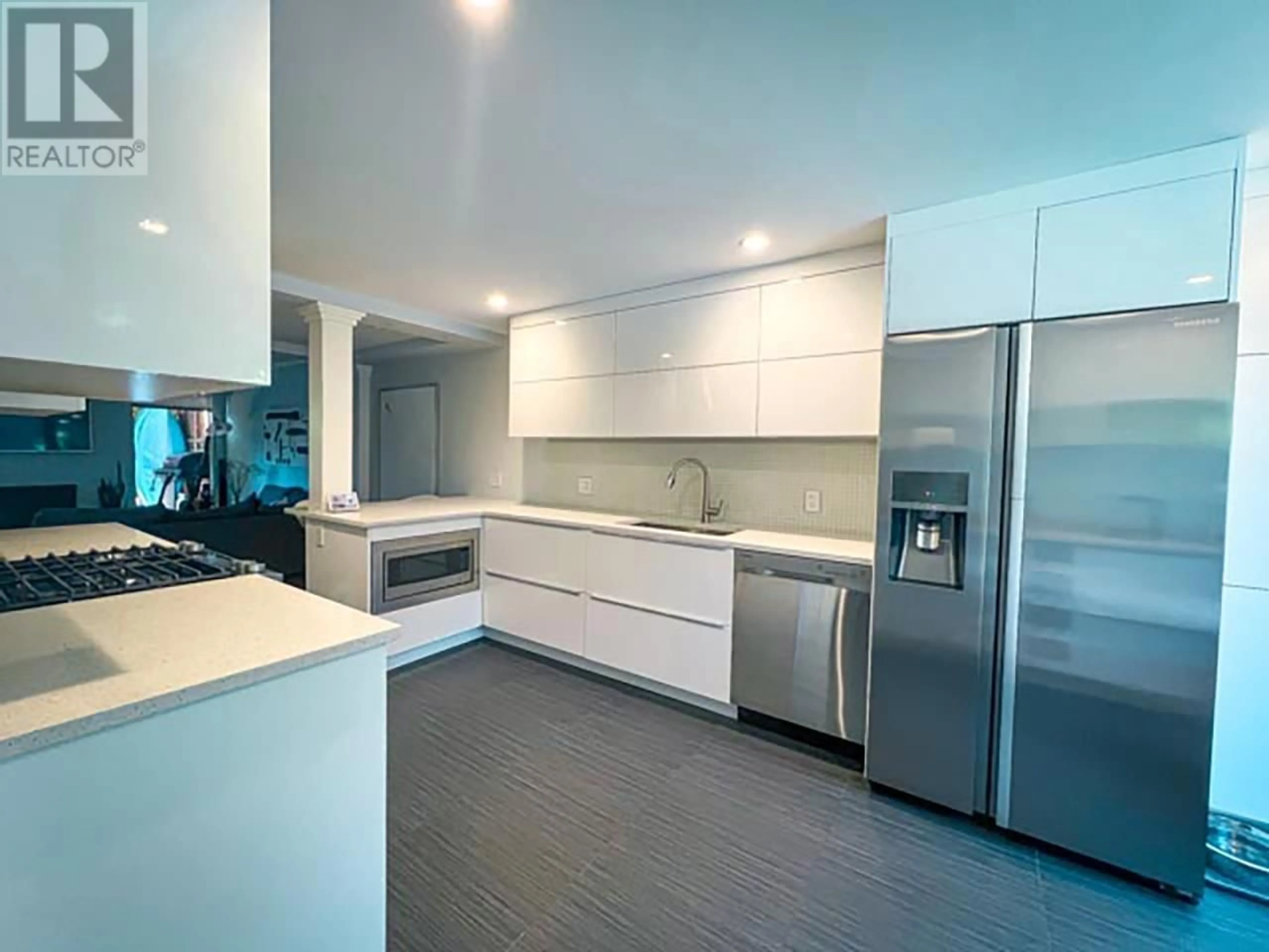 Contemporary kitchen, ceramic/tile floor for 103 - 555 28TH STREET, North Vancouver British Columbia V7N2J7