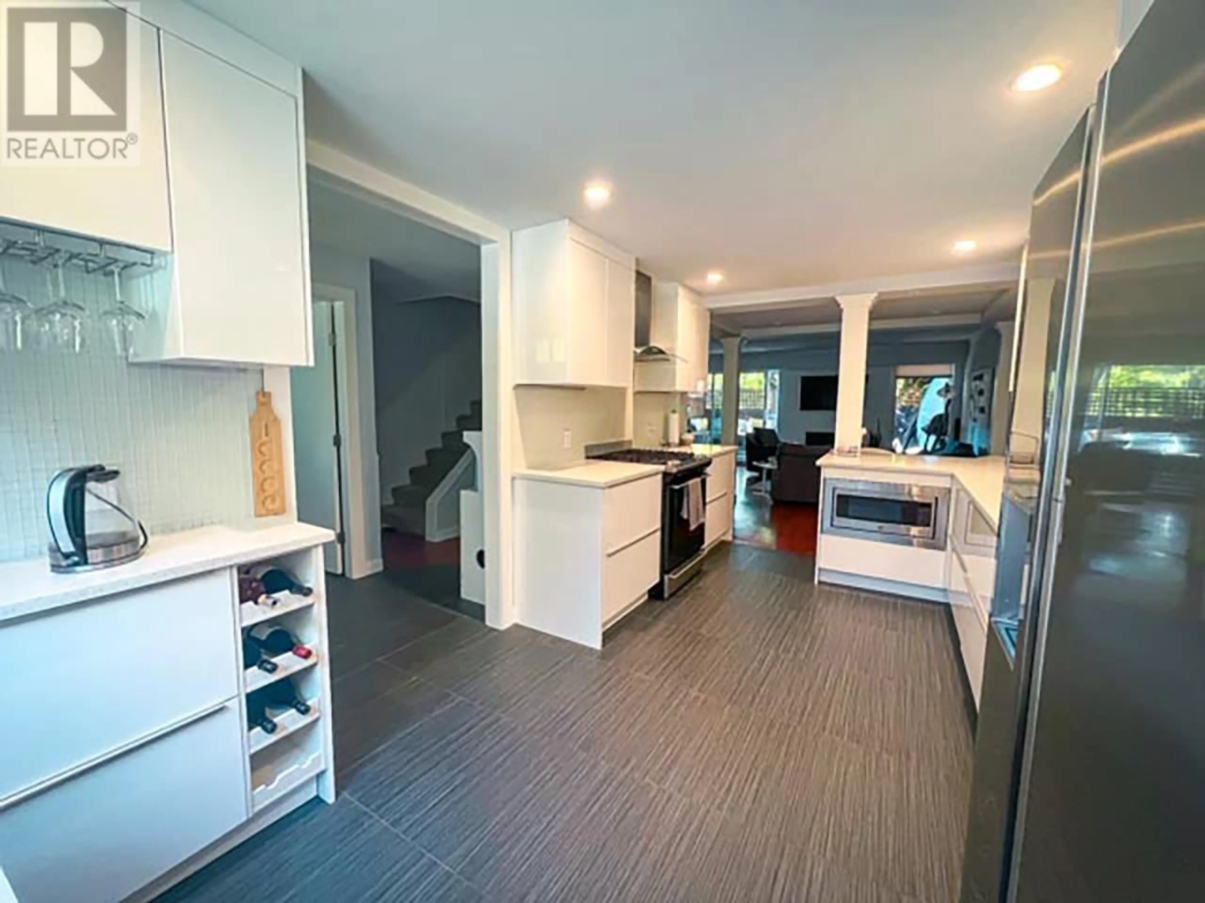 Open concept kitchen, unknown for 103 - 555 28TH STREET, North Vancouver British Columbia V7N2J7