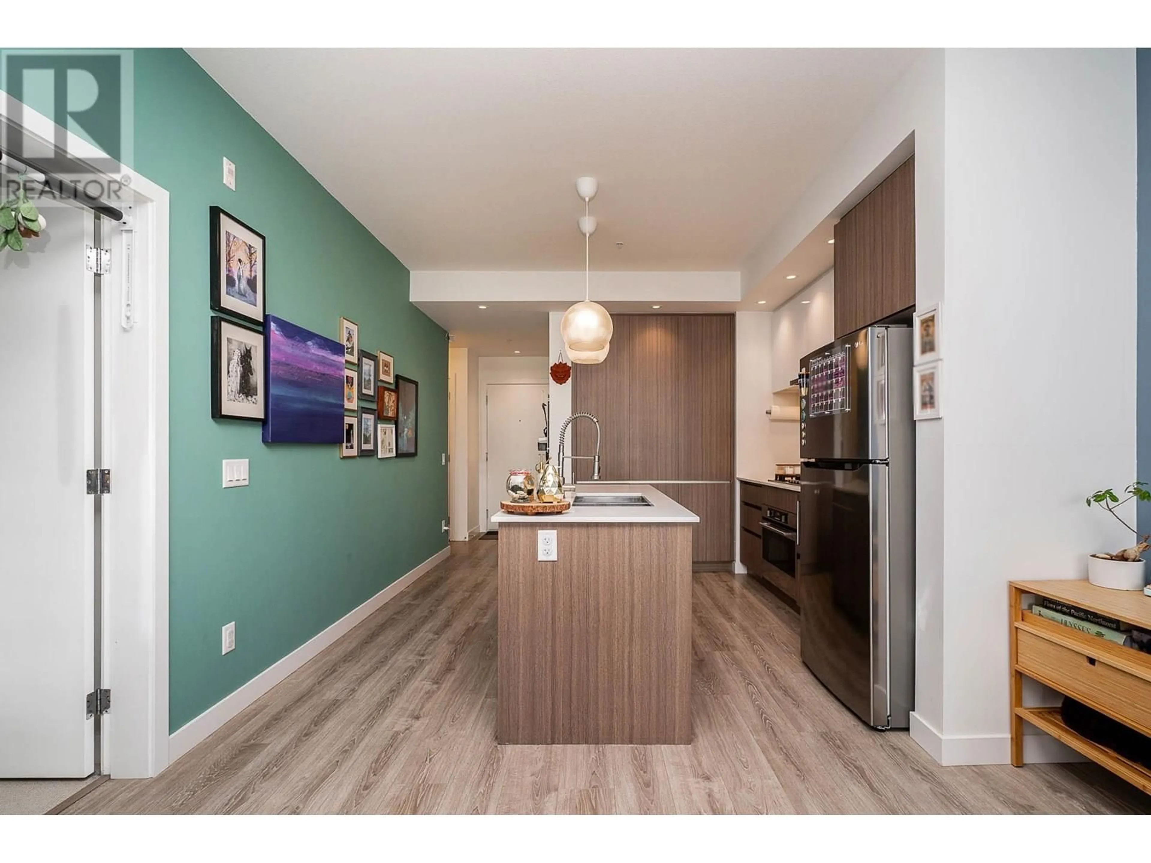 Open concept kitchen, wood/laminate floor for 310 - 516 FOSTER AVENUE, Coquitlam British Columbia V3J0H8