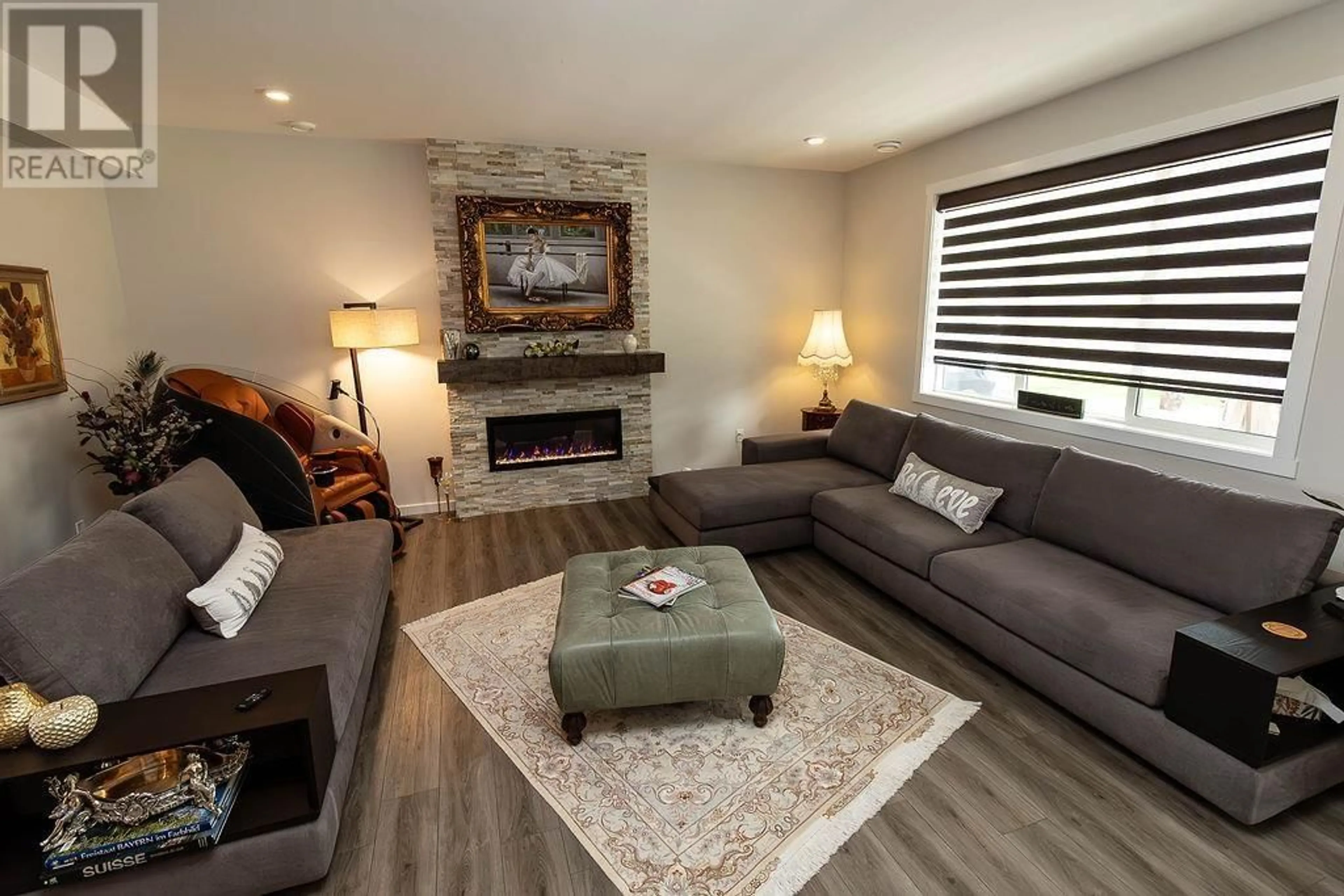 Living room with furniture, wood/laminate floor for 5113 COHO PLACE, Terrace British Columbia V8G5L7