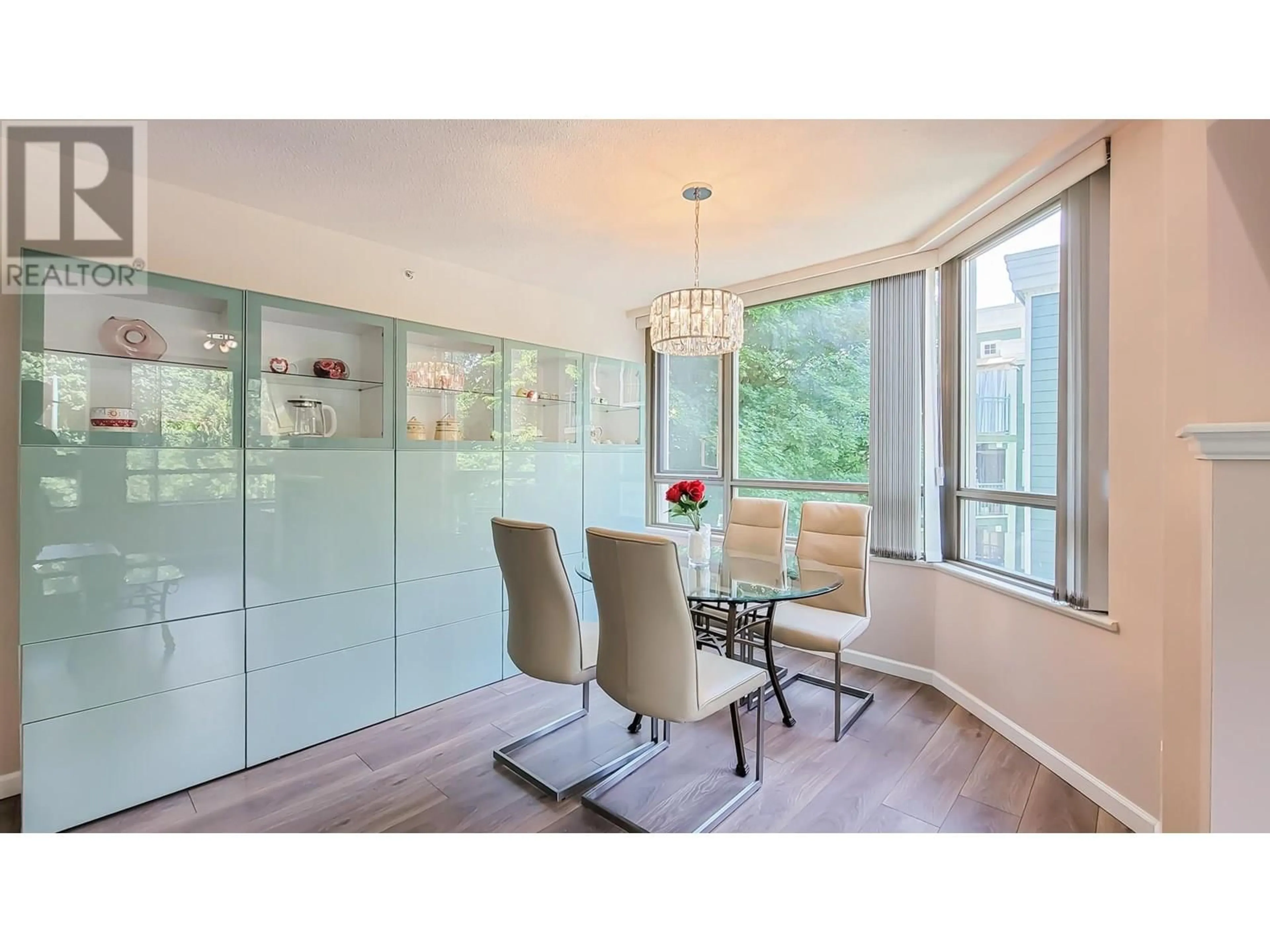 Dining room, wood/laminate floor for 203 - 3070 GUILDFORD WAY, Coquitlam British Columbia V3B7R8
