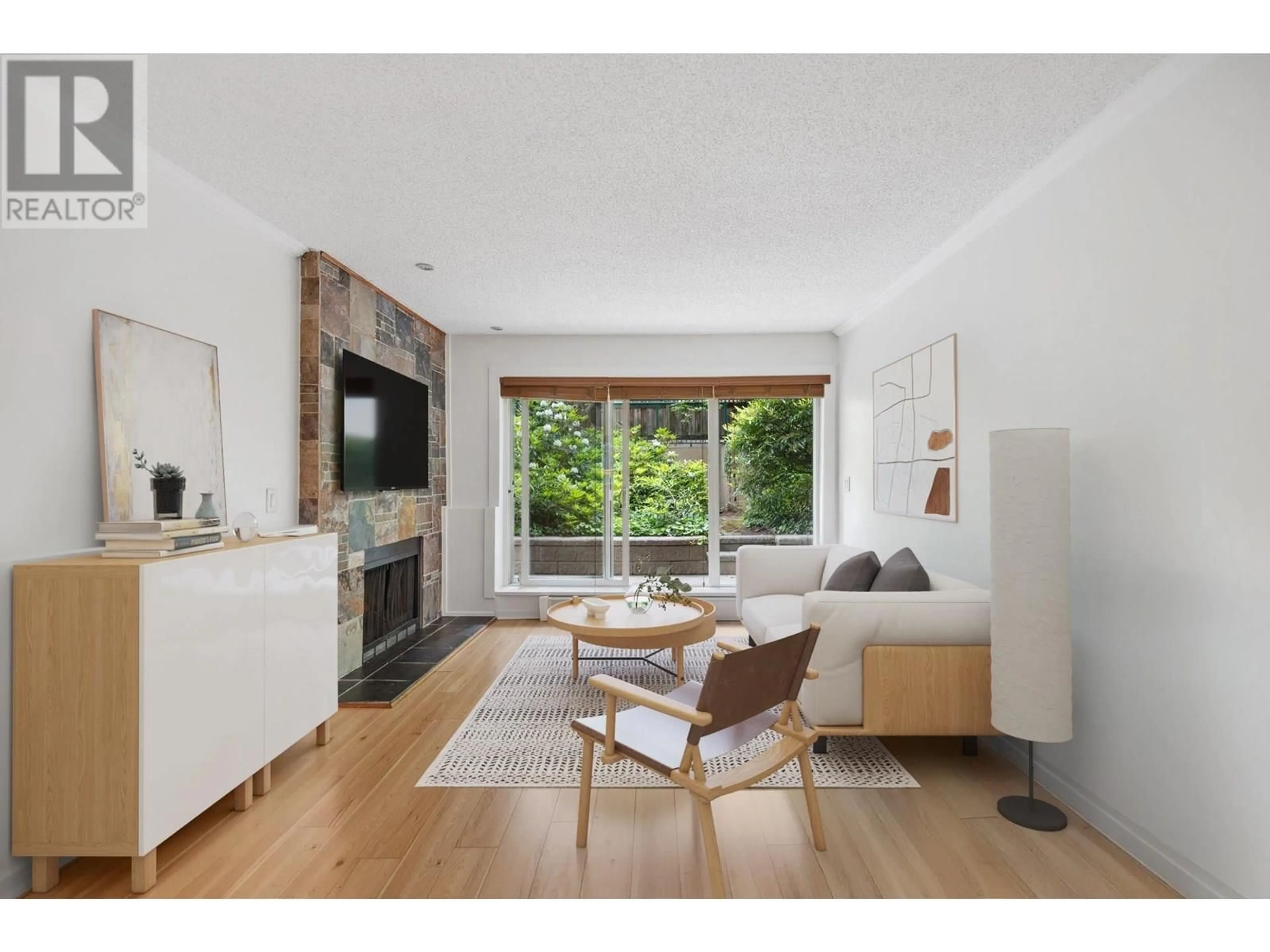 Living room with furniture, wood/laminate floor for 106 - 1169 NELSON STREET, Vancouver British Columbia V6E1J3