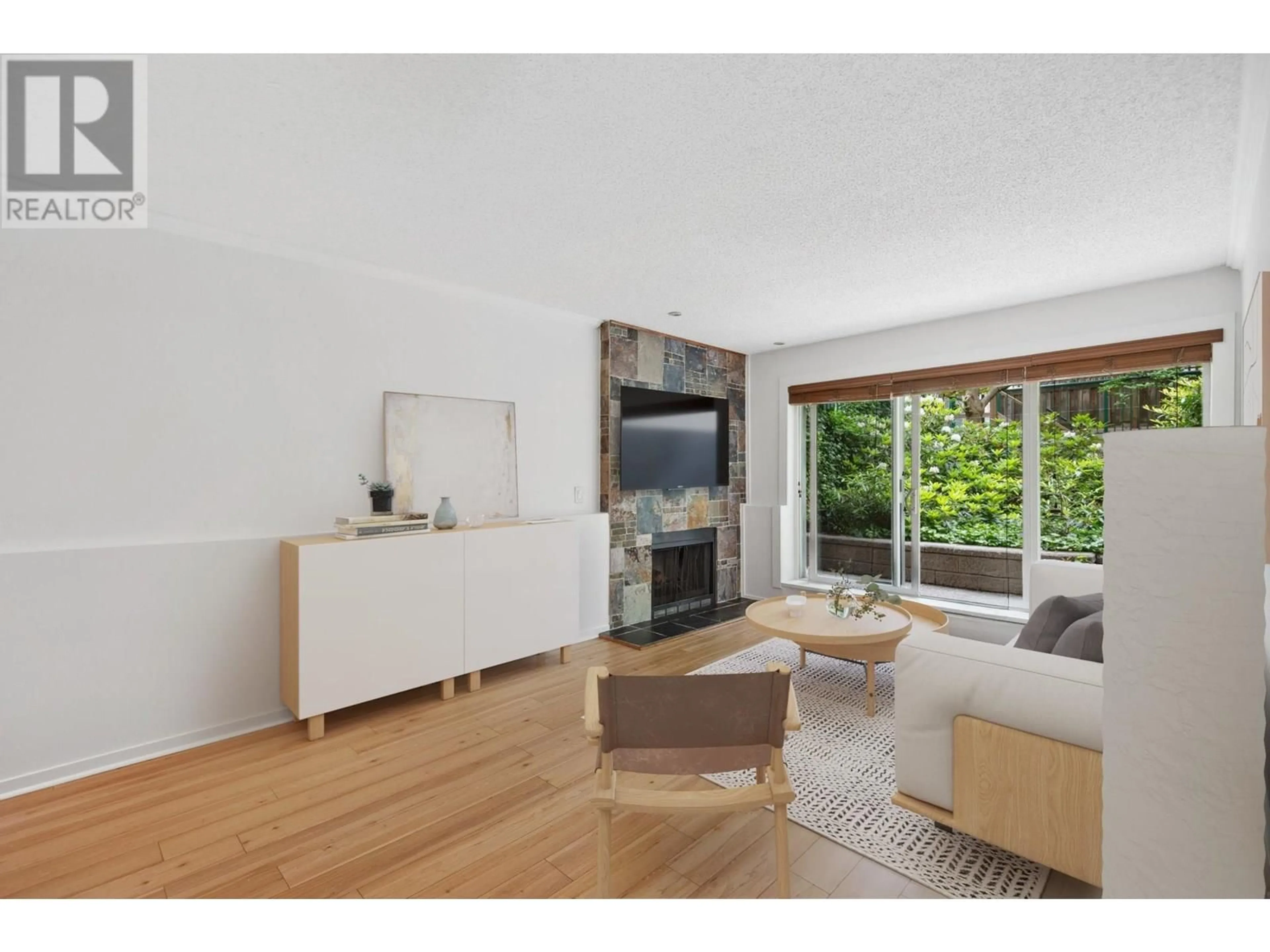 Living room with furniture, wood/laminate floor for 106 - 1169 NELSON STREET, Vancouver British Columbia V6E1J3