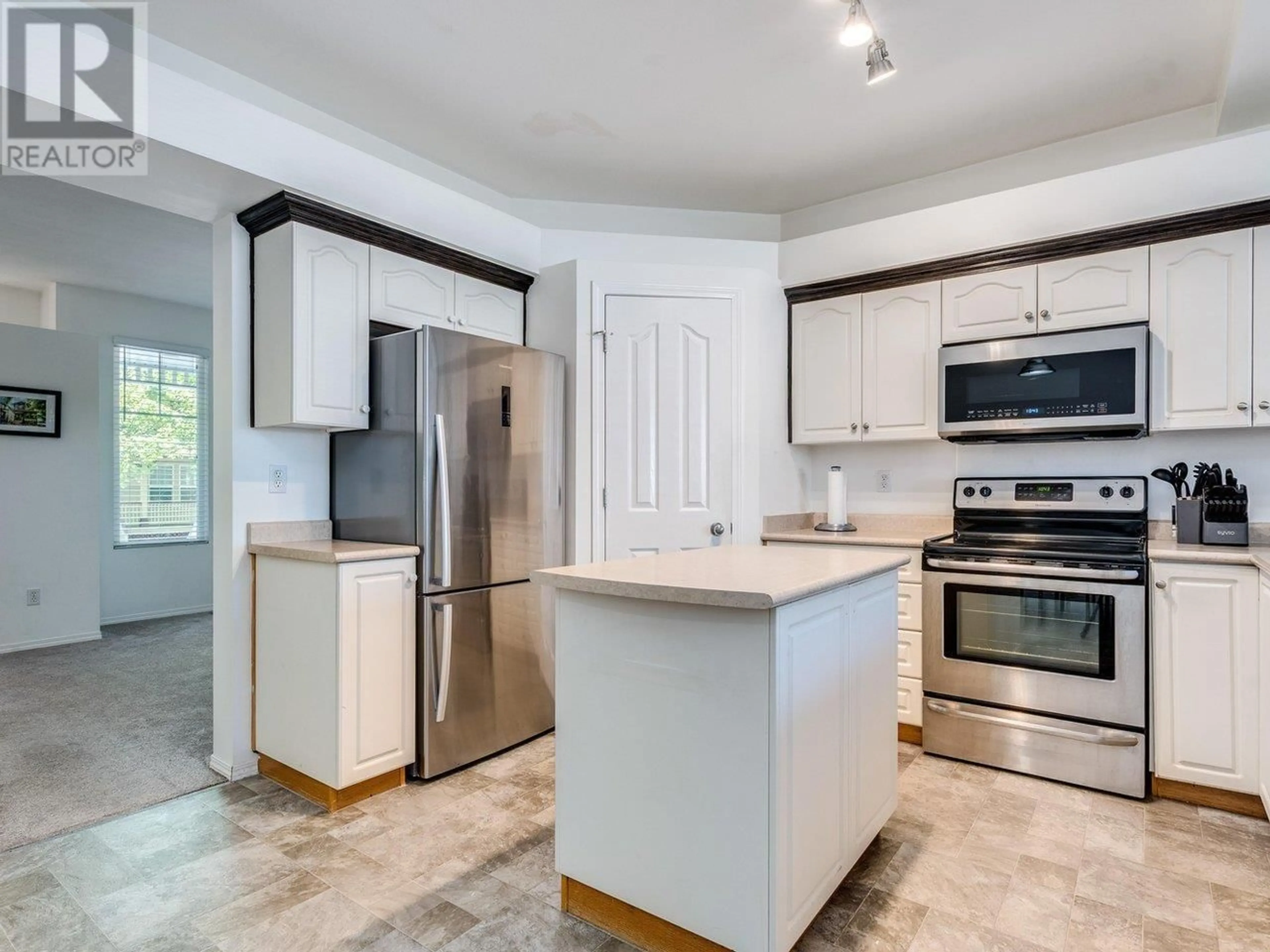 Open concept kitchen, ceramic/tile floor for 10095 243 STREET, Maple Ridge British Columbia V2W1X3