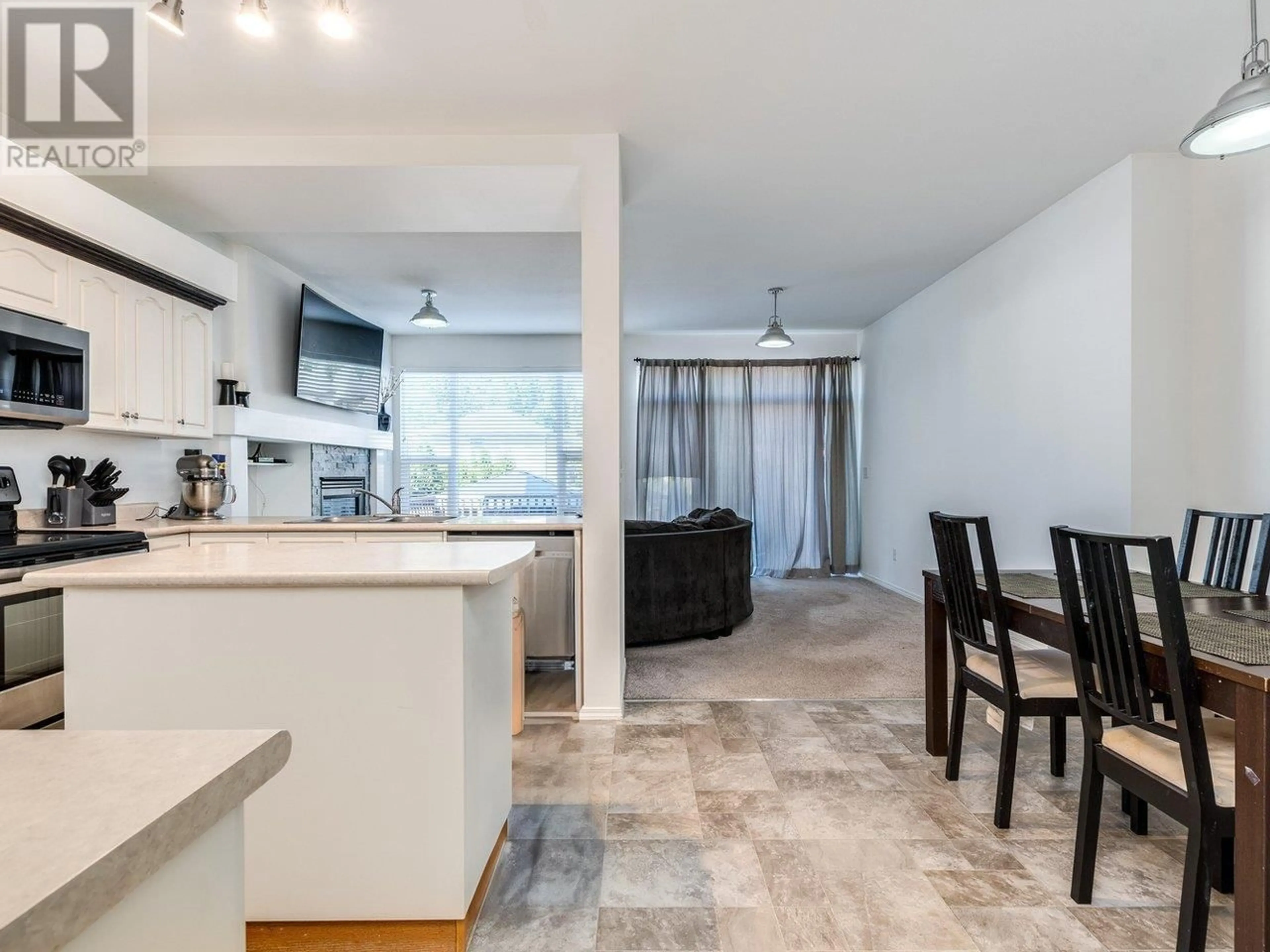 Open concept kitchen, ceramic/tile floor for 10095 243 STREET, Maple Ridge British Columbia V2W1X3