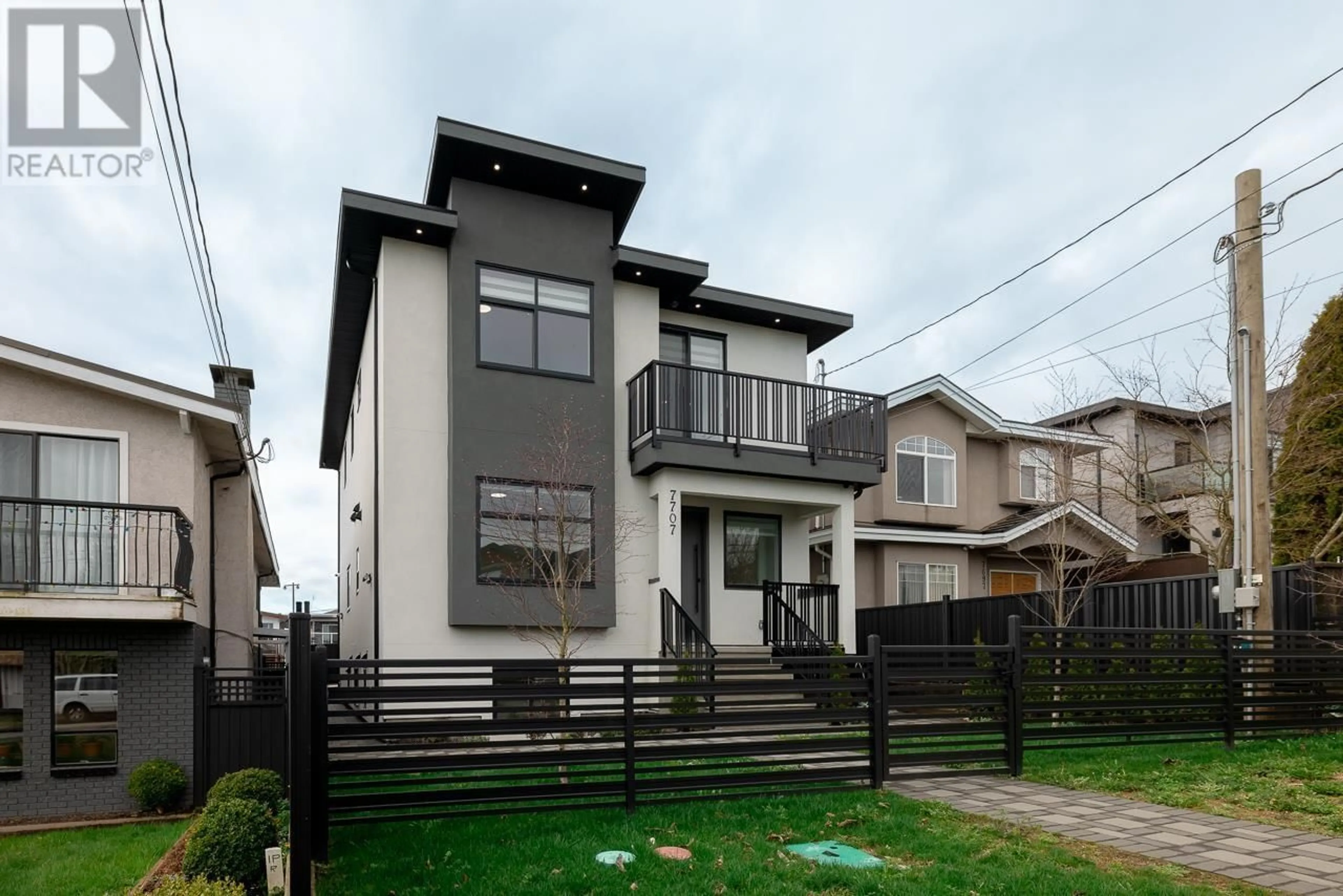 Home with vinyl exterior material, street for 7707 BURGESS STREET, Burnaby British Columbia V3N3J1