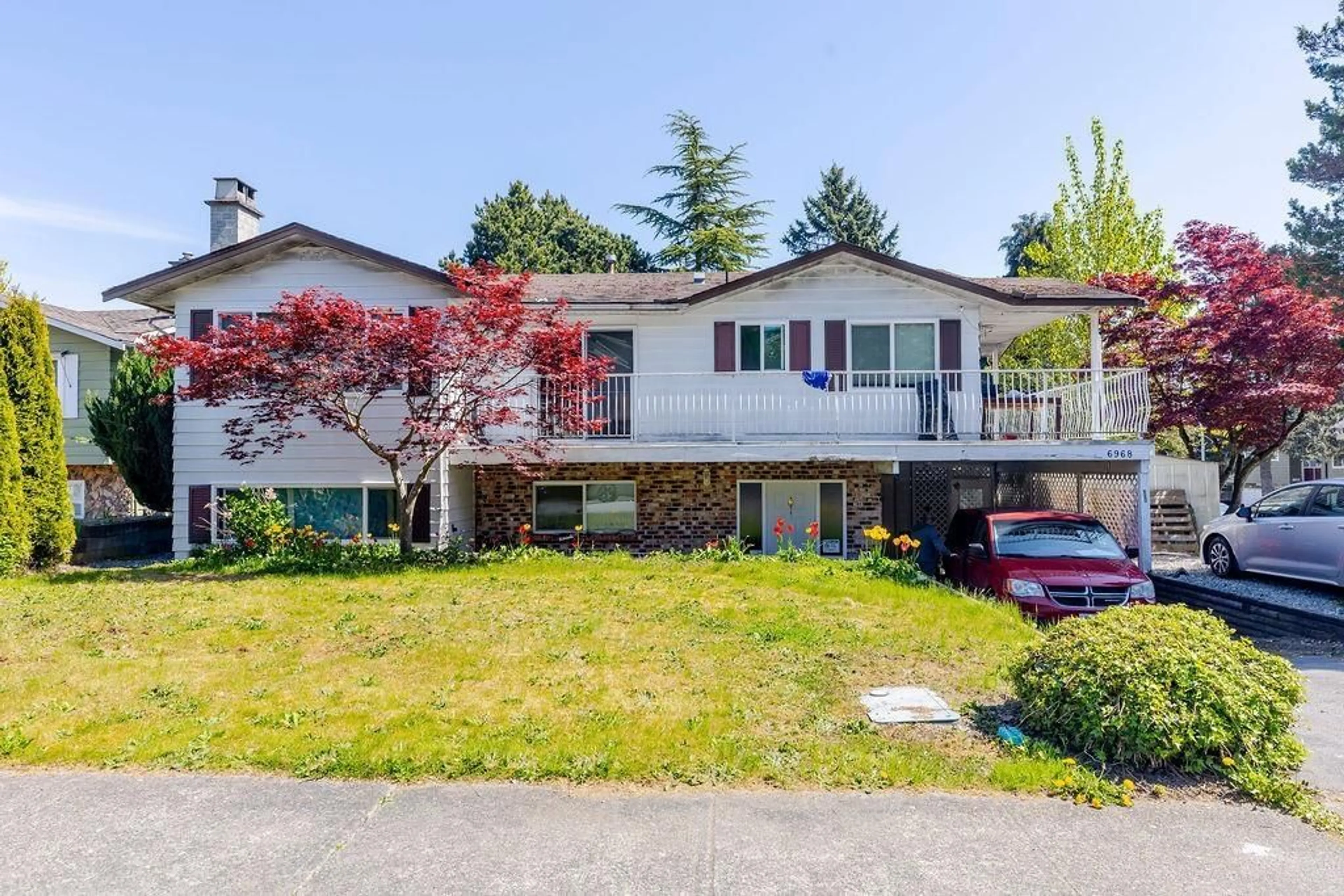 A pic from outside/outdoor area/front of a property/back of a property/a pic from drone, street for 6968 BISON, Delta British Columbia V4E2C2