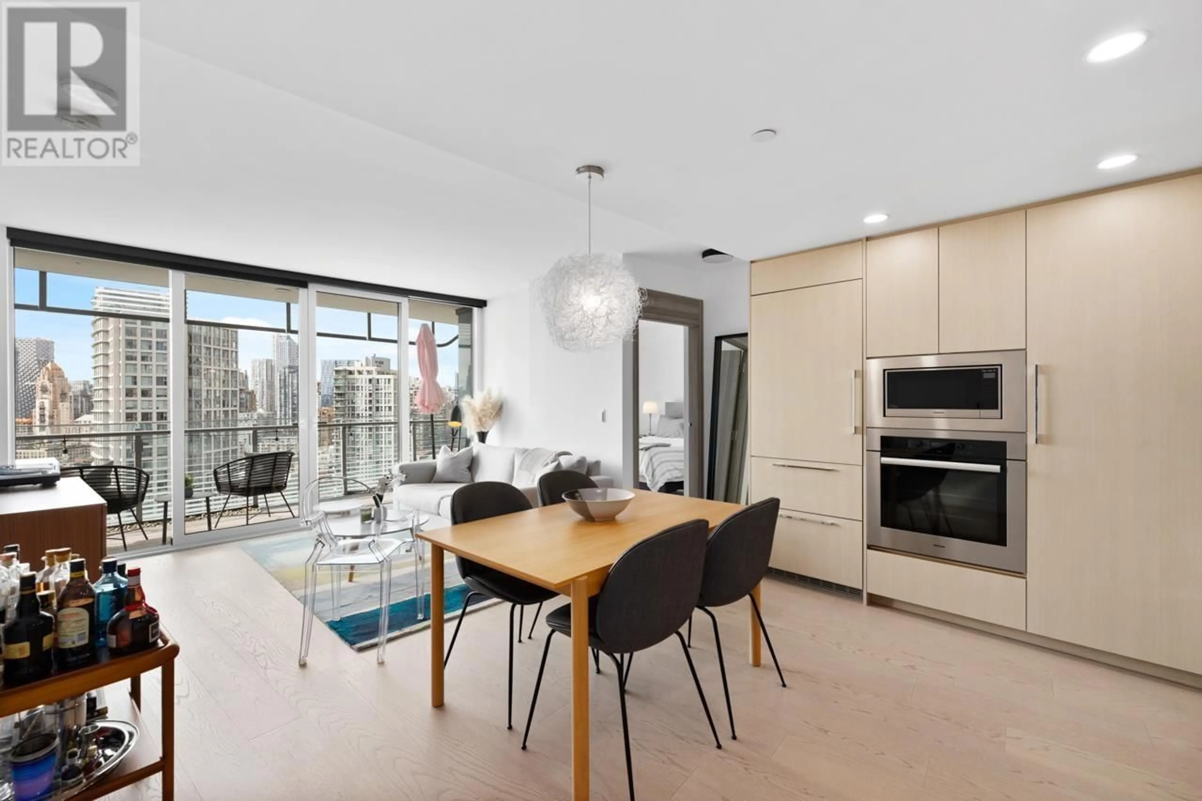Open concept kitchen, wood/laminate floor for 2420 - 89 NELSON STREET, Vancouver British Columbia V6Z0E7