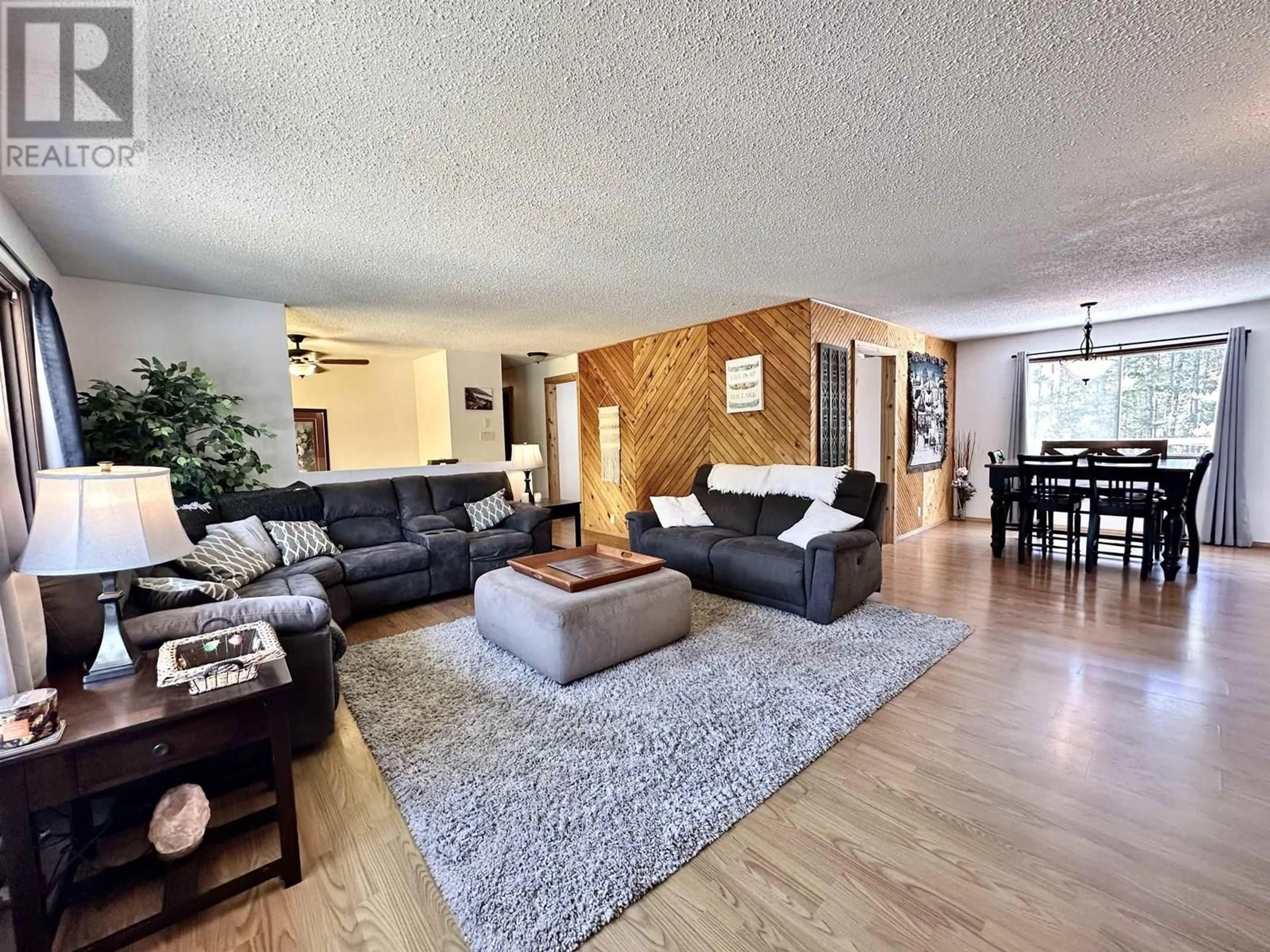 Living room with furniture, wood/laminate floor for 1505 5 HIGHWAY, Valemount British Columbia V0E2Z0