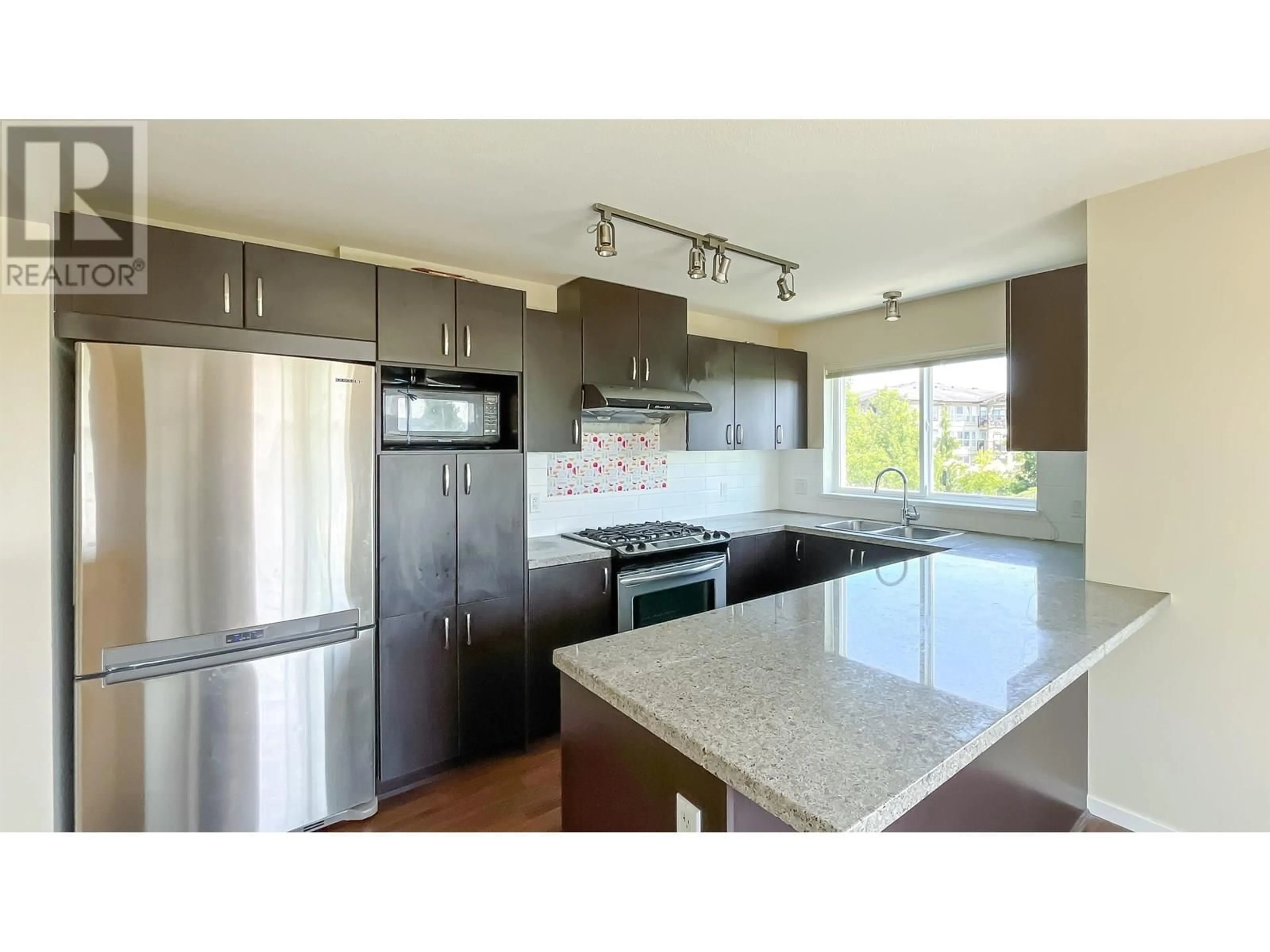 Open concept kitchen, unknown for 203 - 3050 DAYANEE SPRINGS BOULEVARD, Coquitlam British Columbia V3E0A2