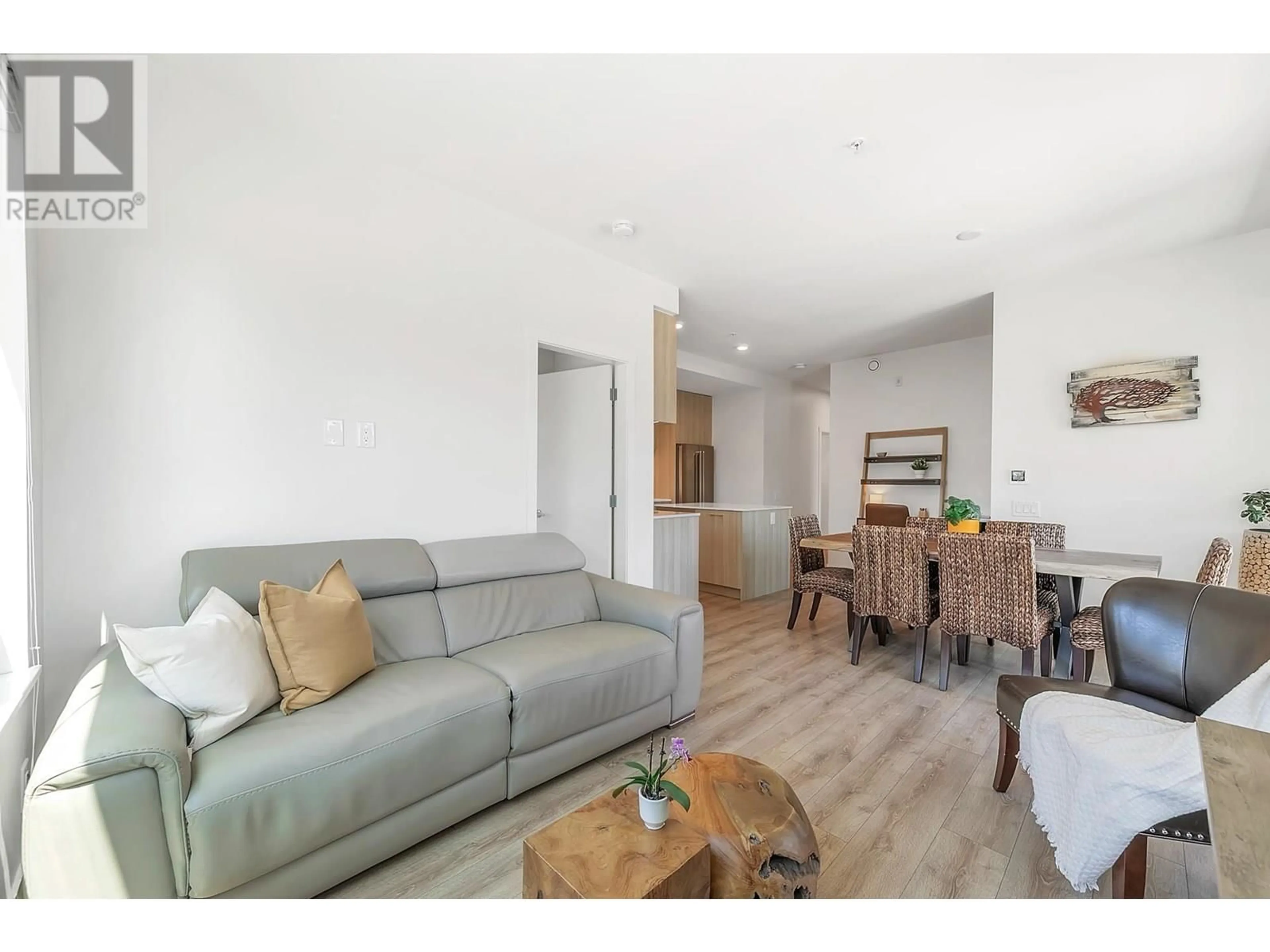 Living room with furniture, wood/laminate floor for 223 - 721 ANSKAR COURT, Coquitlam British Columbia V3J0L4