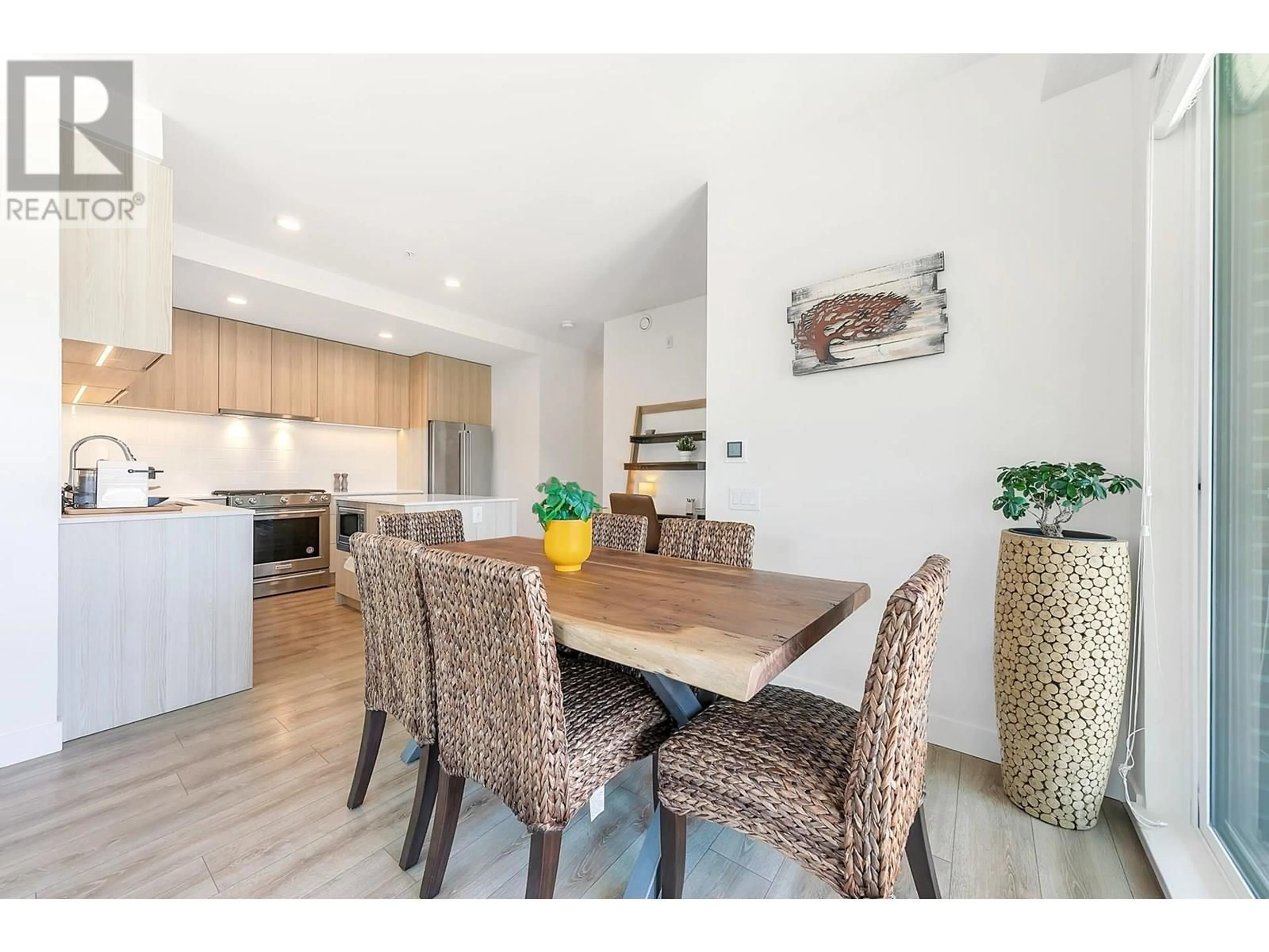 Open concept kitchen, wood/laminate floor for 223 - 721 ANSKAR COURT, Coquitlam British Columbia V3J0L4