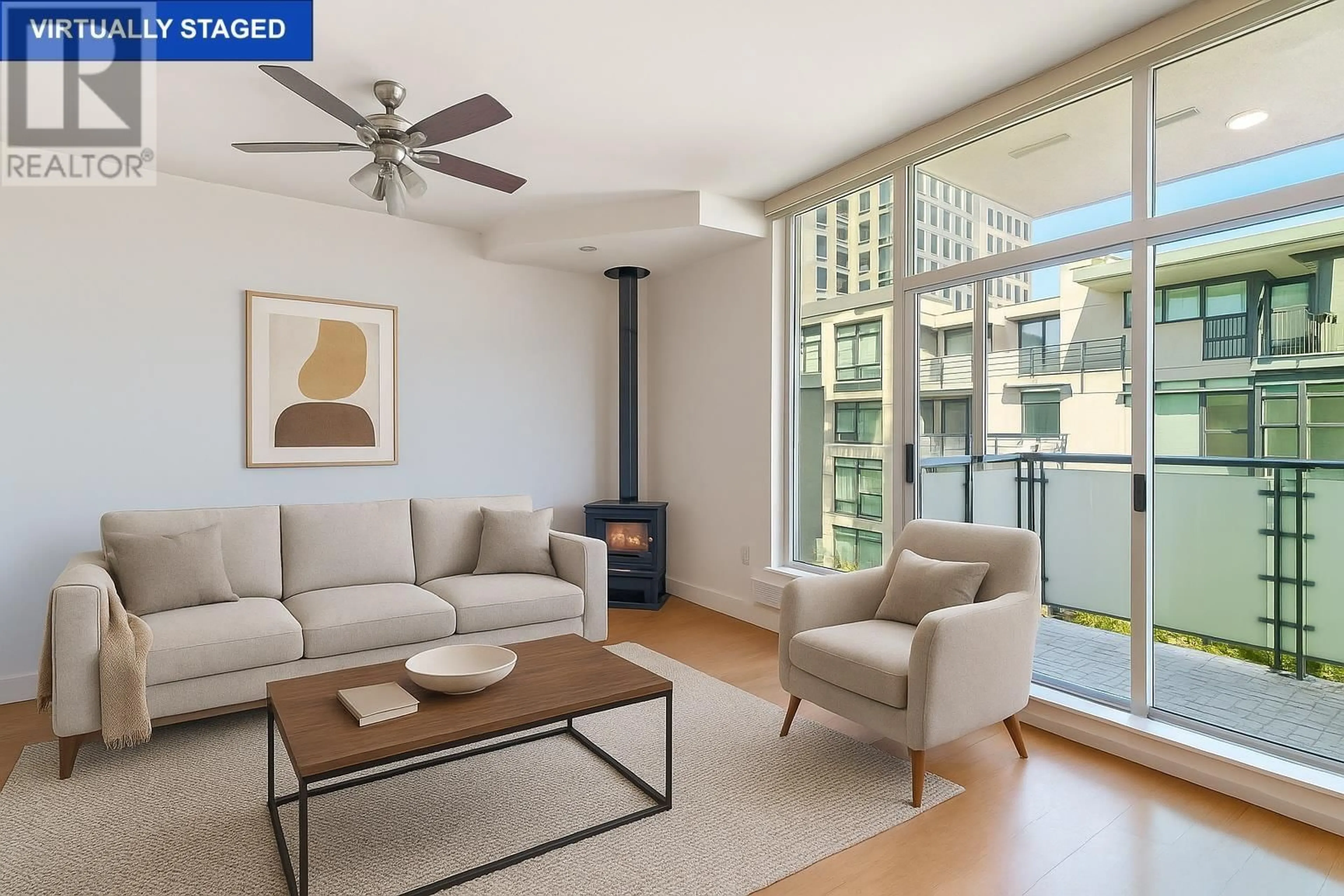 Living room with furniture, wood/laminate floor for 413 - 8988 HUDSON STREET, Vancouver British Columbia V6P6Z1