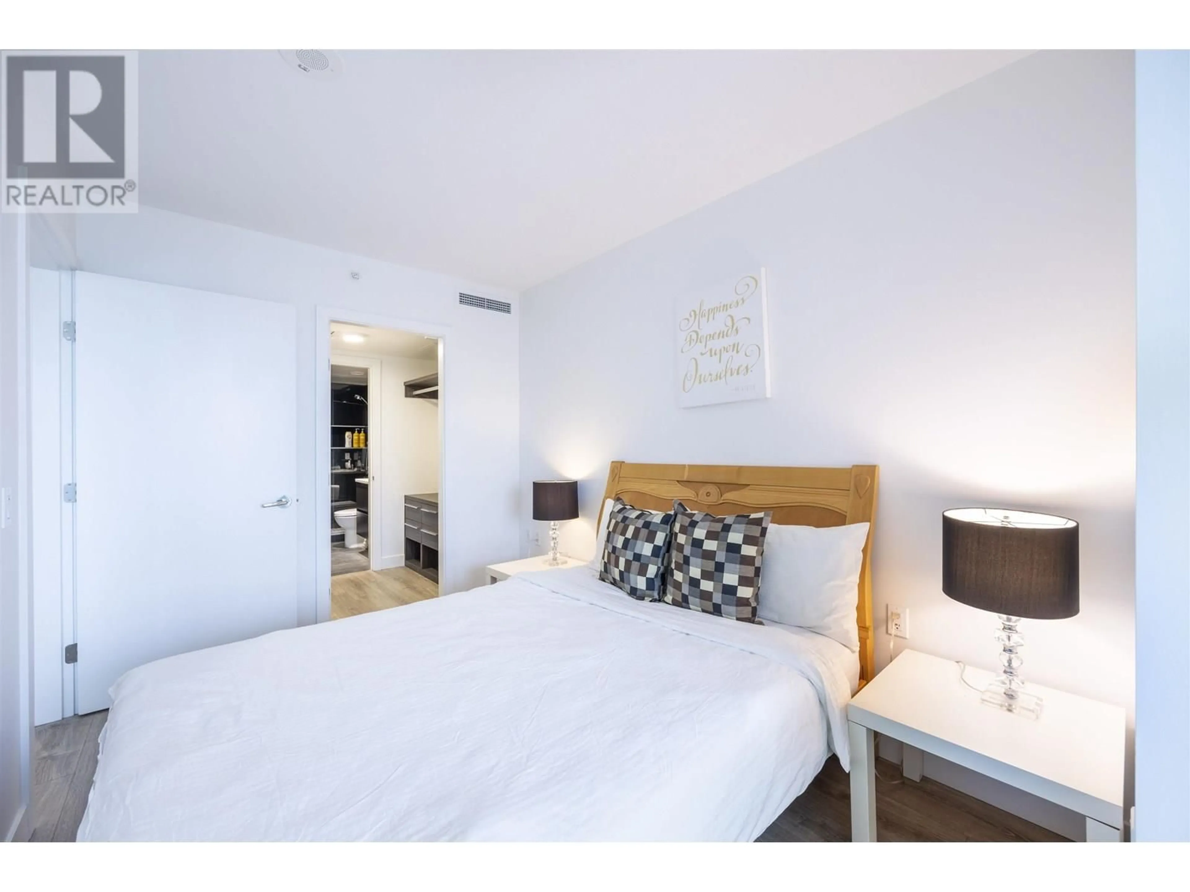Bedroom with bed, wood/laminate floor for 620 - 6328 NO. 3 ROAD, Richmond British Columbia V6Y0L6