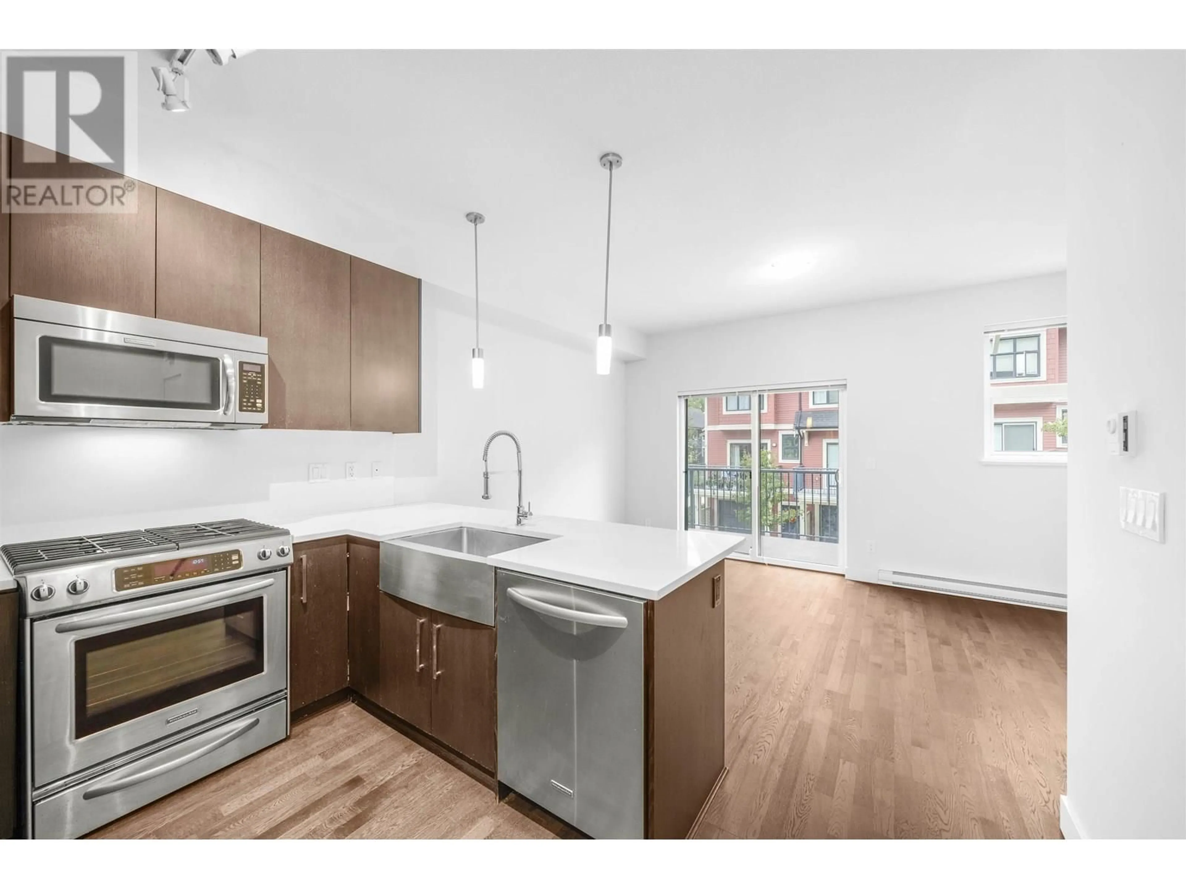 Open concept kitchen, unknown for 703 - 8485 NEW HAVEN CLOSE, Burnaby British Columbia V5J0B7