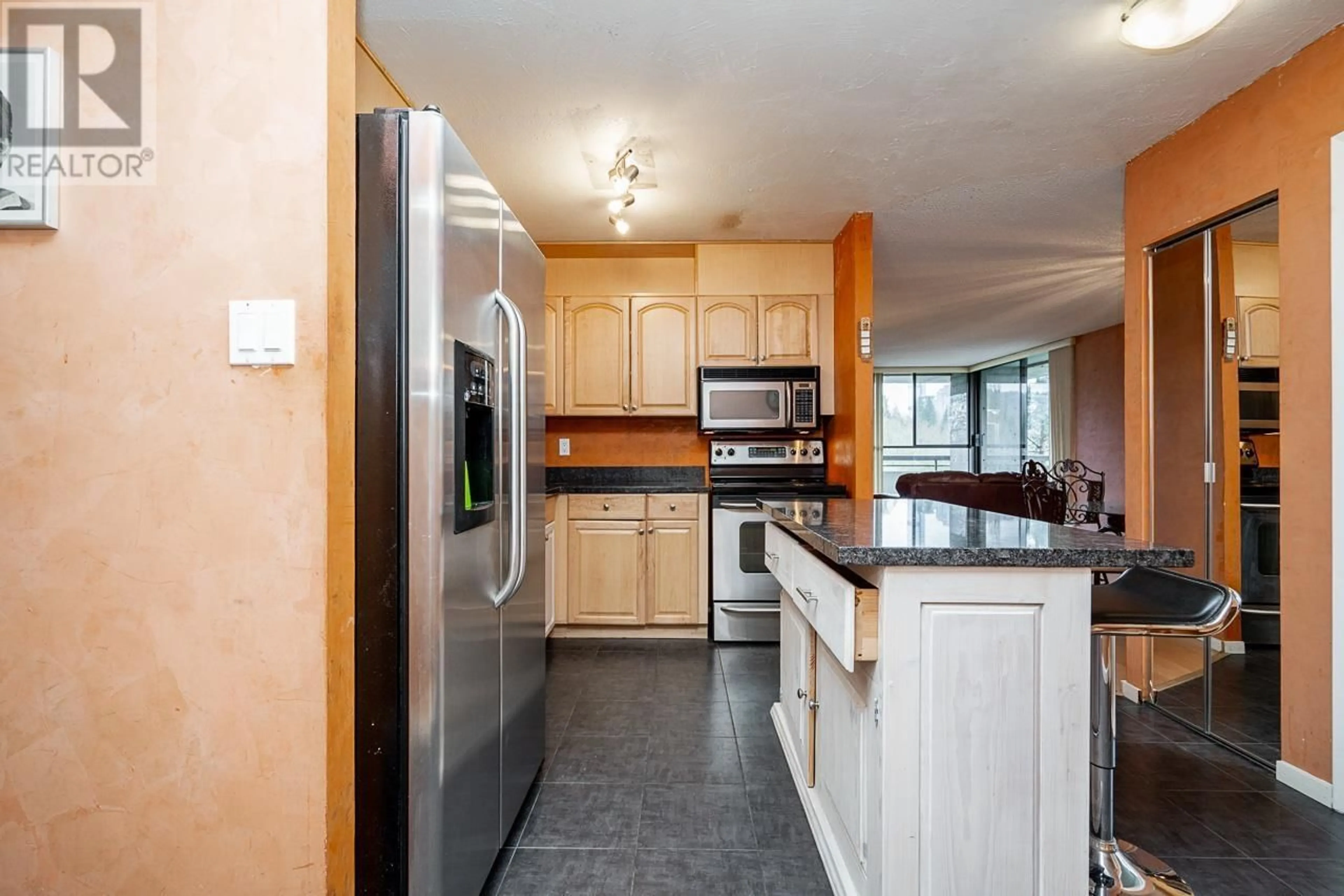 Open concept kitchen, ceramic/tile floor for 406 - 3755 BARTLETT COURT, Burnaby British Columbia V3J7G7