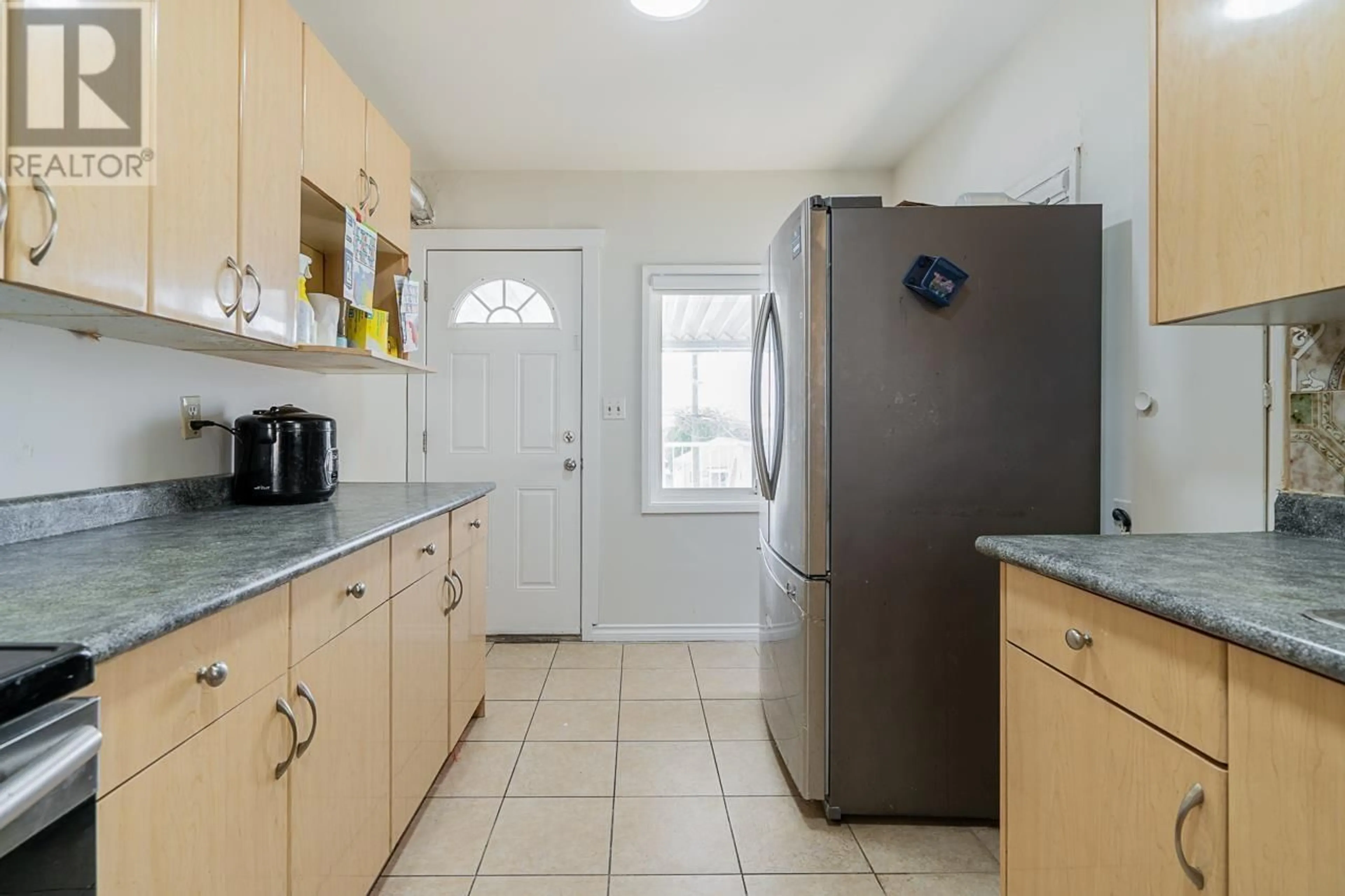 Standard kitchen, ceramic/tile floor for 882 63RD AVENUE, Vancouver British Columbia V5X2K8