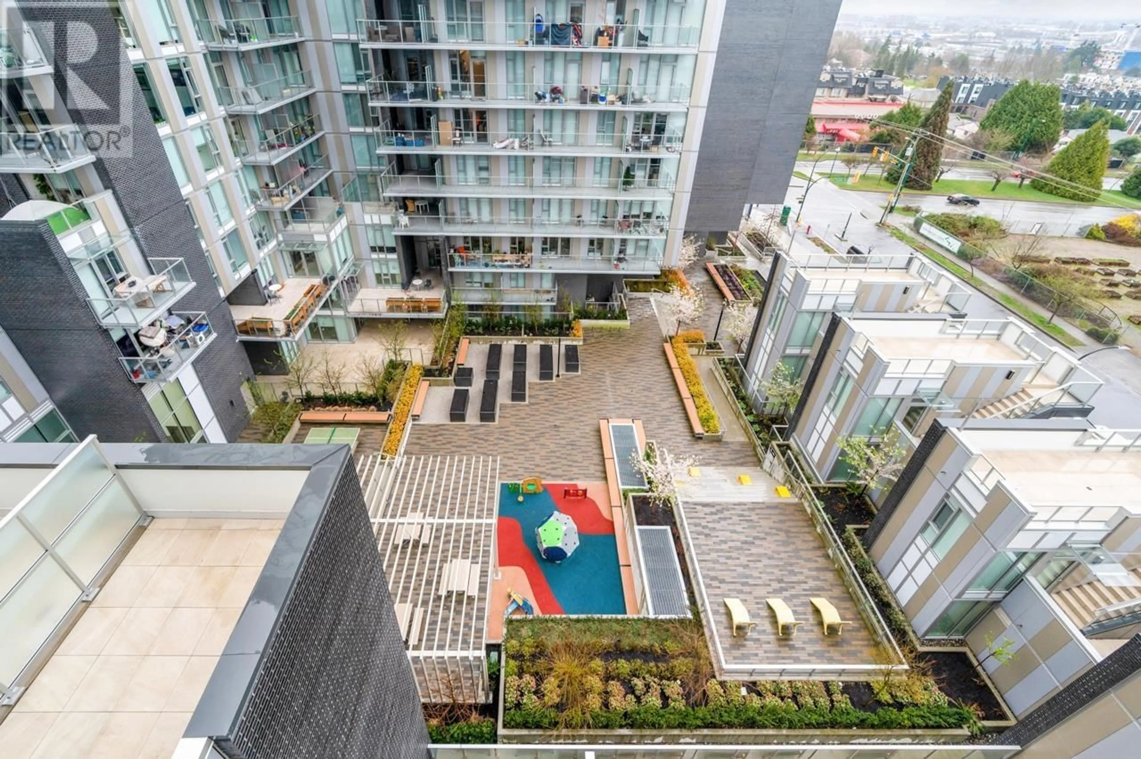 Patio, city buildings view from balcony for 802 - 7418 PAULSON STREET, Vancouver British Columbia V6P0K2