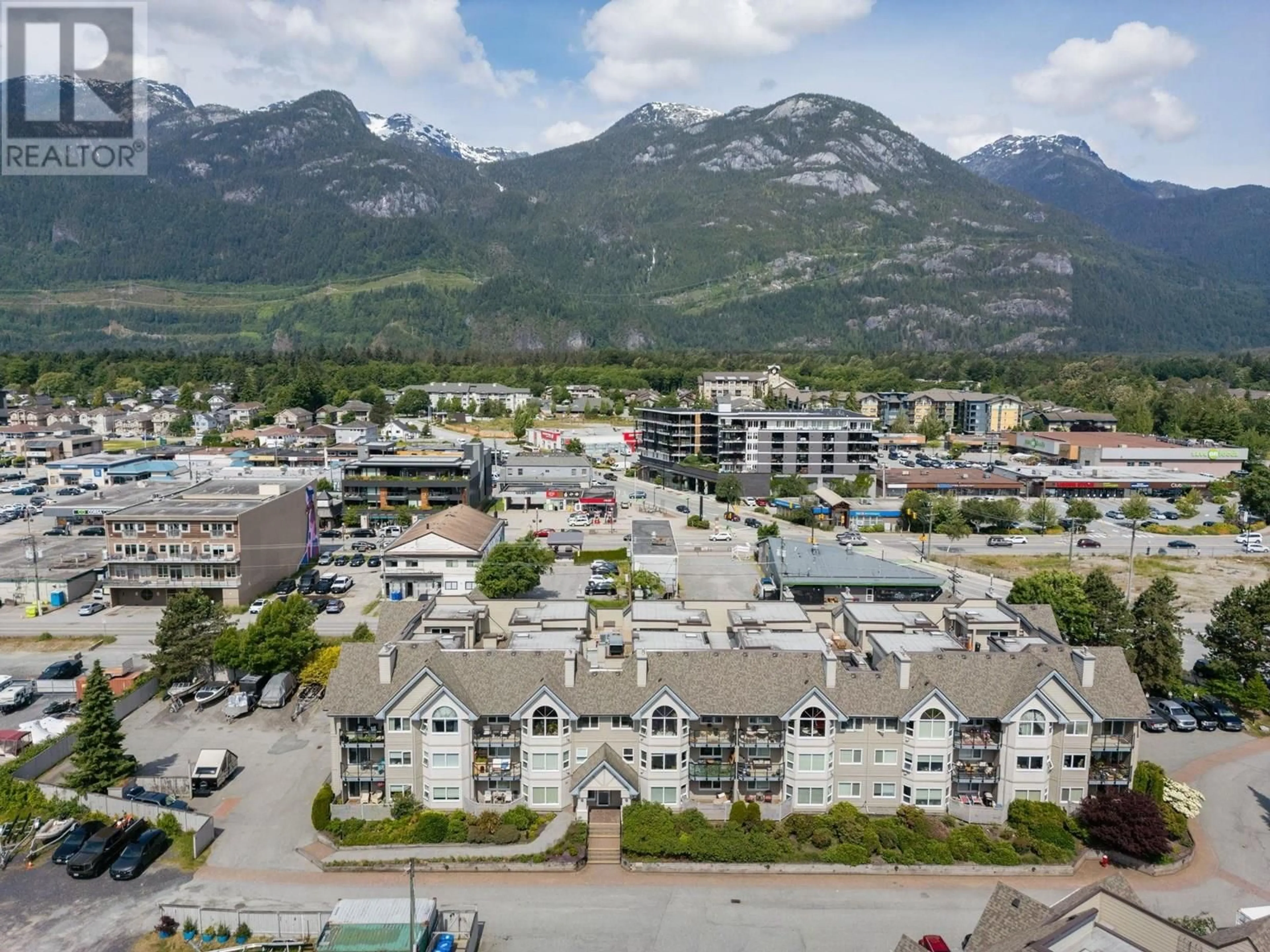A pic from outside/outdoor area/front of a property/back of a property/a pic from drone, mountain view for 312 - 1466 PEMBERTON AVENUE, Squamish British Columbia V8B0K1