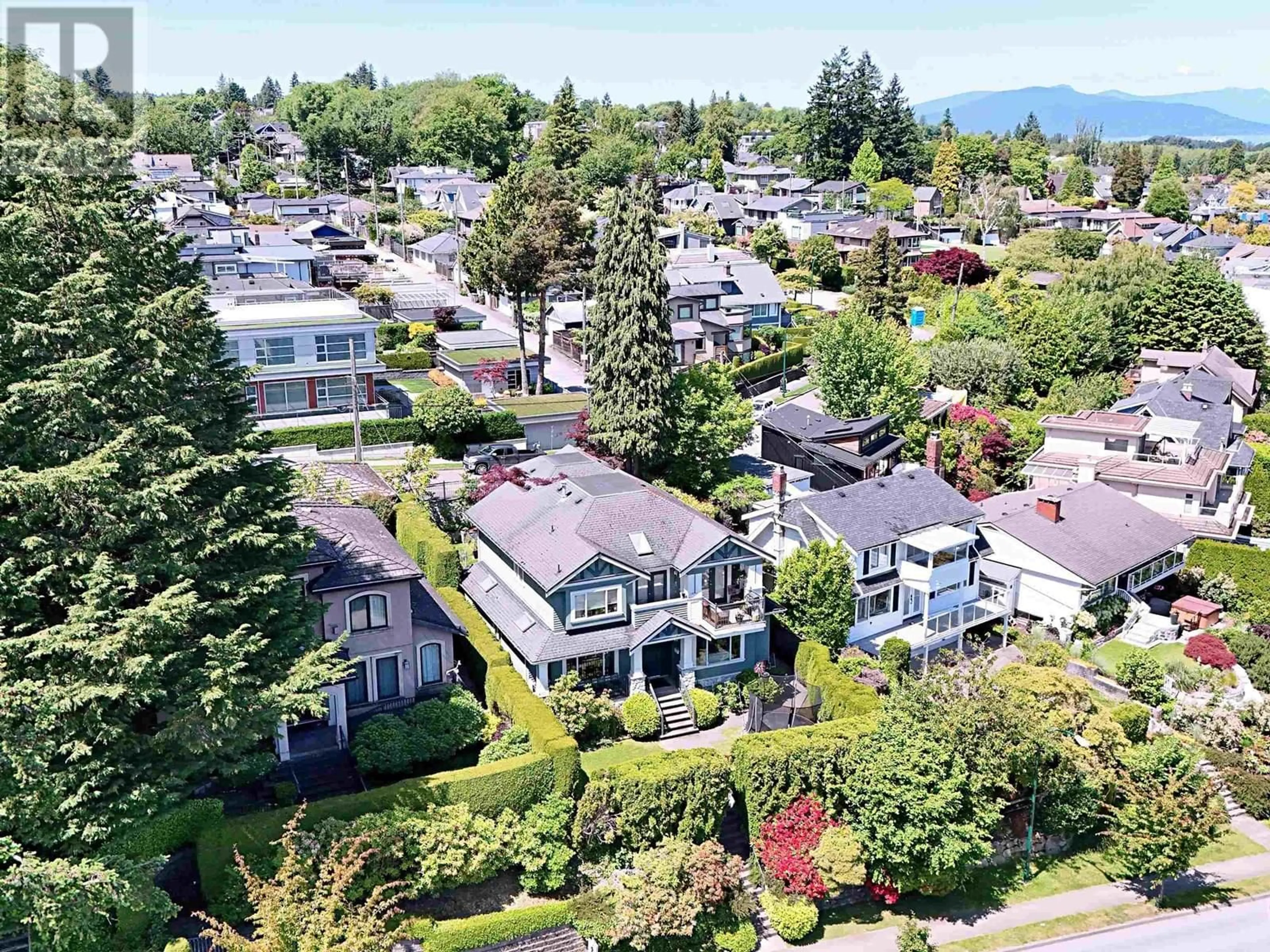 A pic from outside/outdoor area/front of a property/back of a property/a pic from drone, mountain view for 3461 BLENHEIM STREET, Vancouver British Columbia V6L2X8