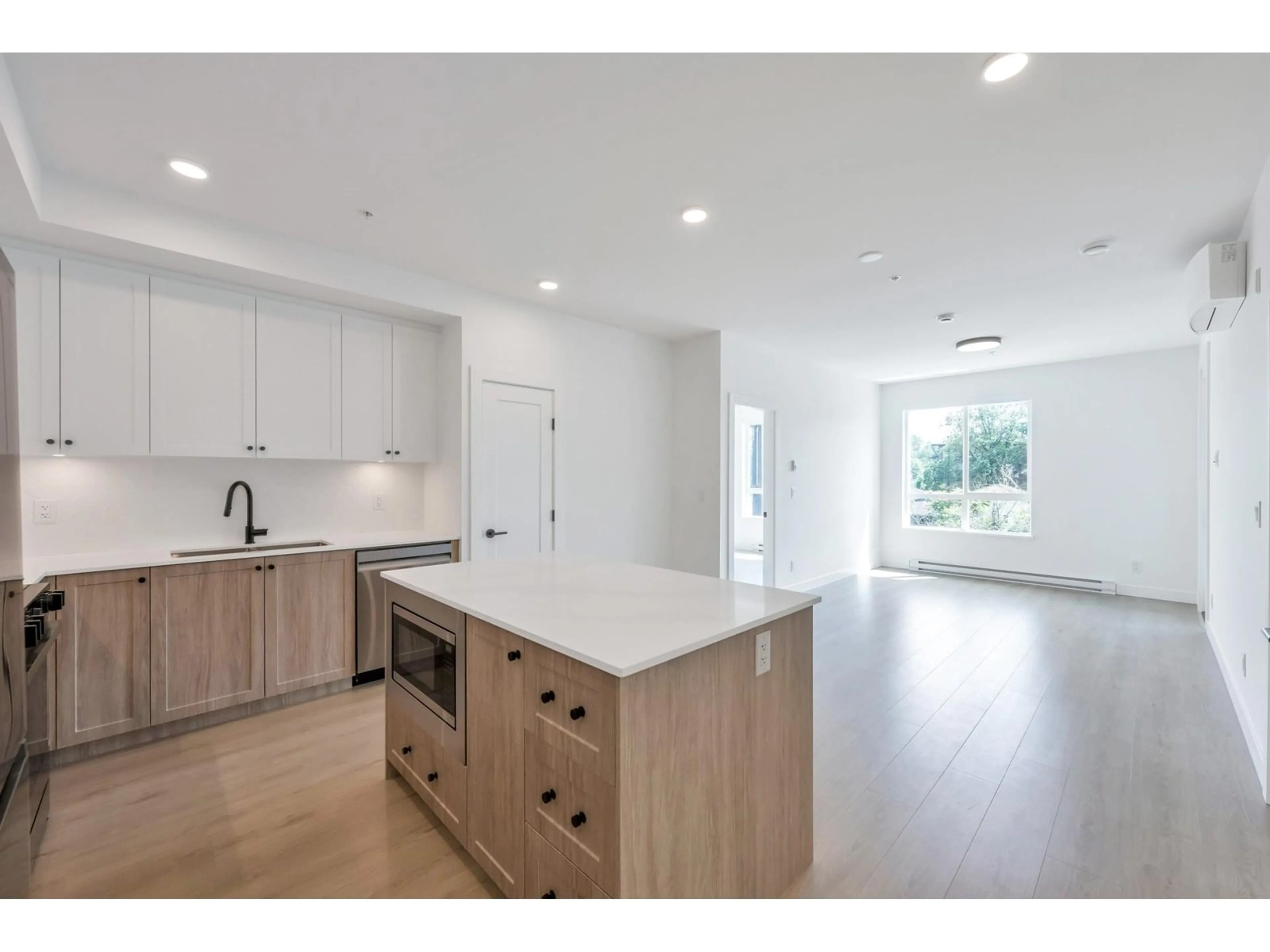 Open concept kitchen, unknown for 314 - 19979 76, Langley British Columbia V2Y3Y2