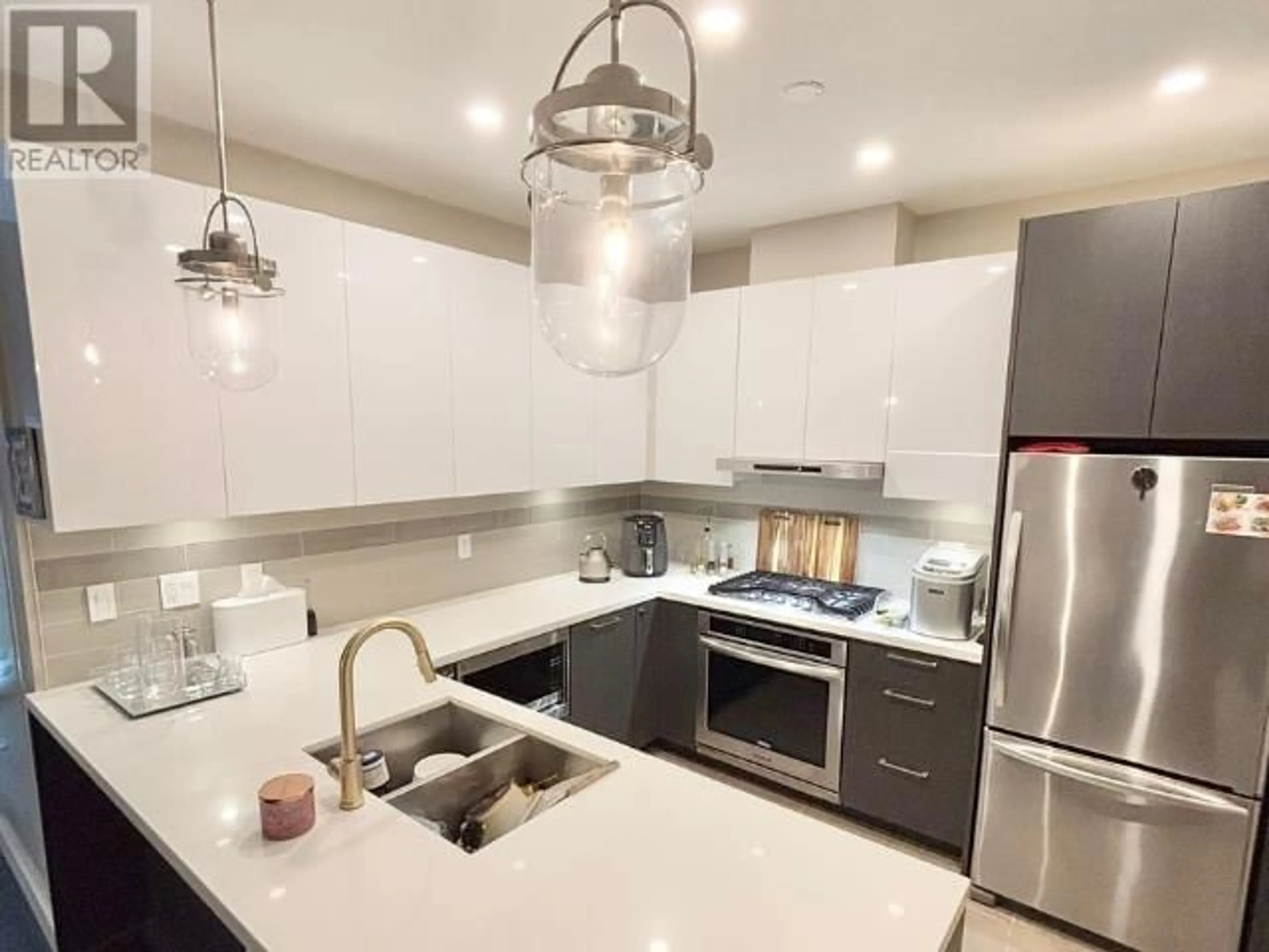 Open concept kitchen, ceramic/tile floor for 602 - 5399 CEDARBRIDGE WAY, Richmond British Columbia V6X0L6
