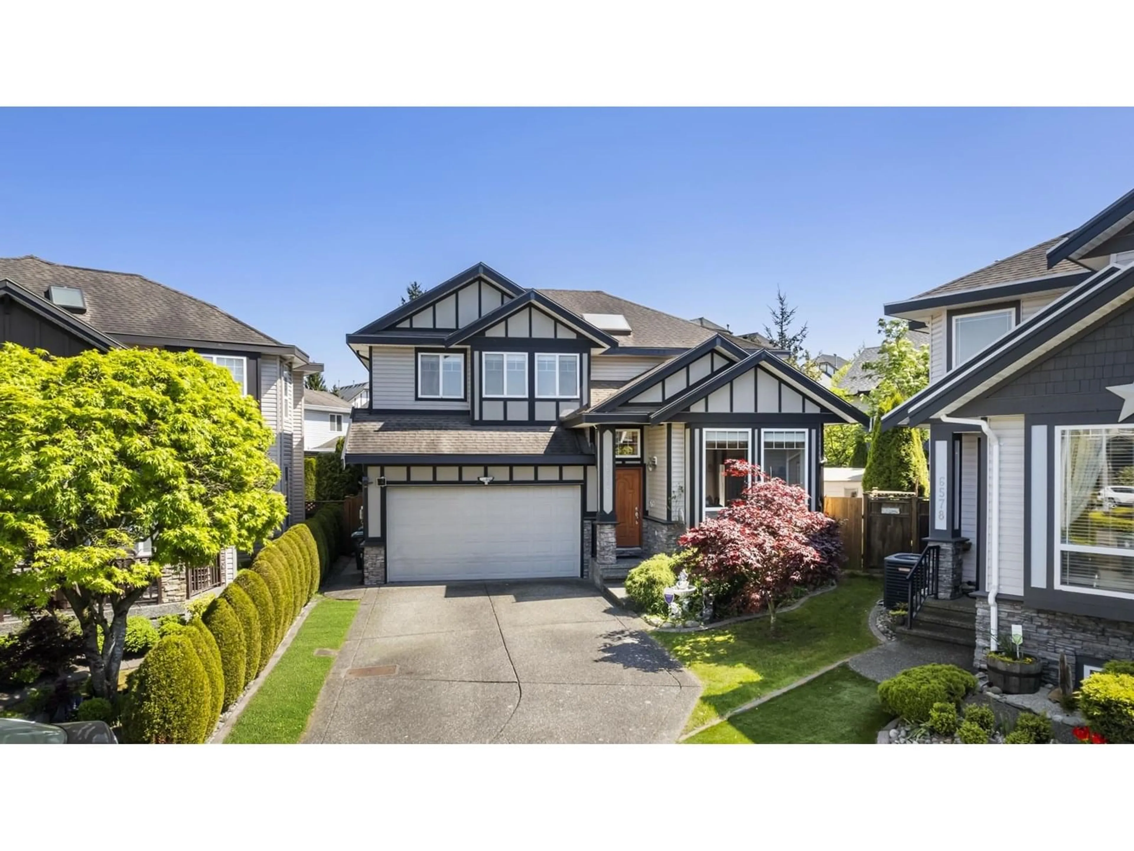 Home with vinyl exterior material, street for 6586 186A, Surrey British Columbia V3S4E5