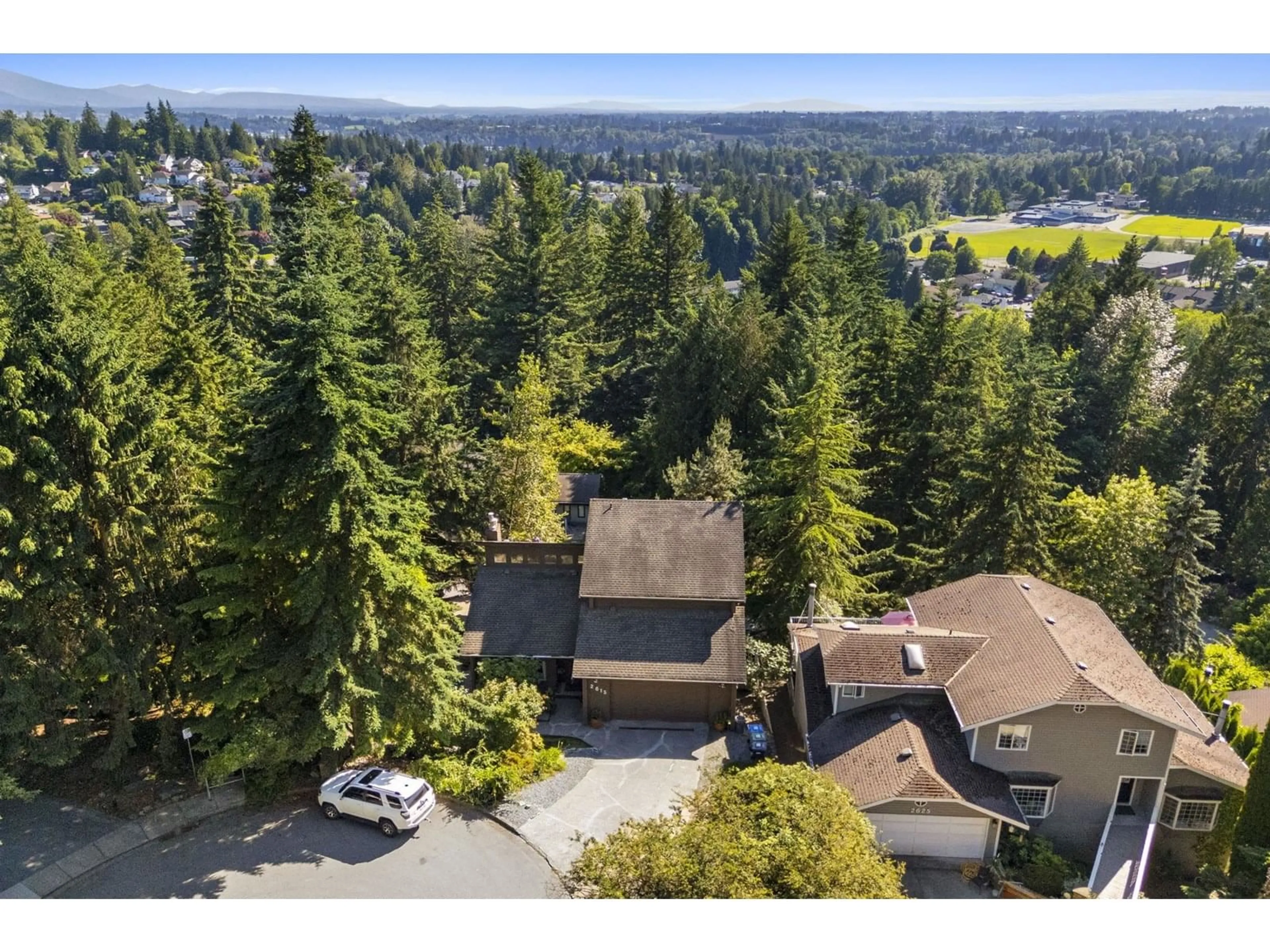 A pic from outside/outdoor area/front of a property/back of a property/a pic from drone, forest/trees view for 2615 ST GALLEN, Abbotsford British Columbia V3G1C3