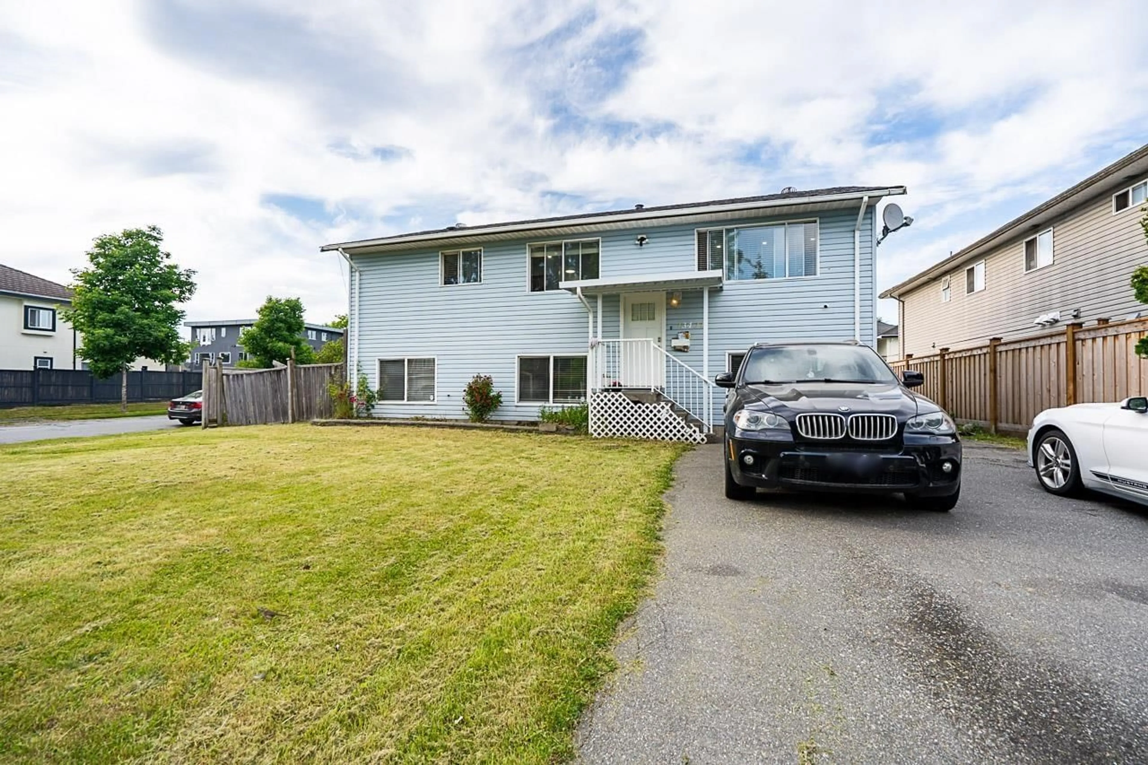 A pic from outside/outdoor area/front of a property/back of a property/a pic from drone, street for 13421 87A, Surrey British Columbia V3W6B7