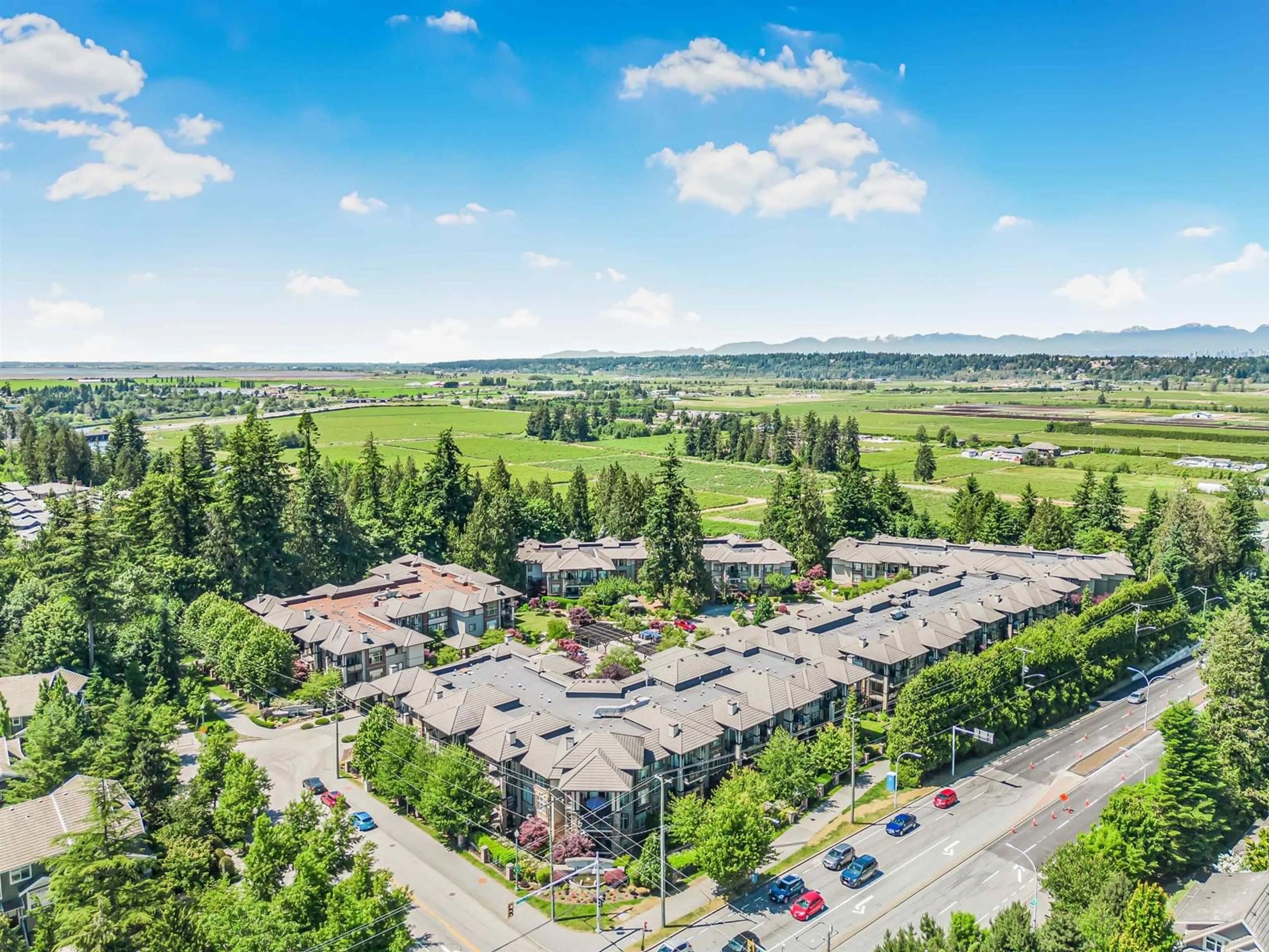 A pic from outside/outdoor area/front of a property/back of a property/a pic from drone, mountain view for 105 - 15195 36TH, Surrey British Columbia V3S4R3
