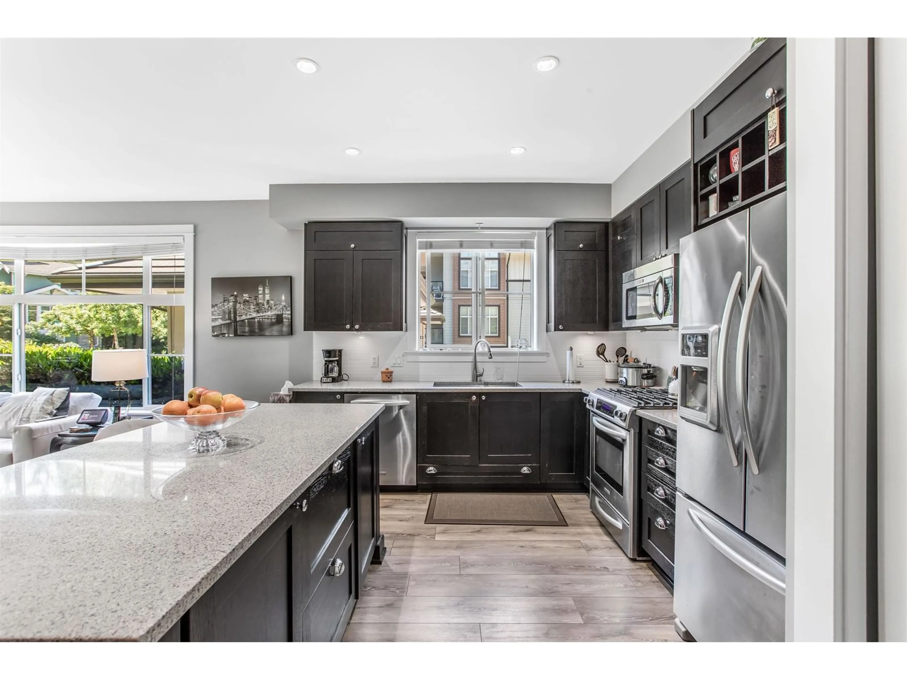 Open concept kitchen, ceramic/tile floor for 105 - 15195 36TH, Surrey British Columbia V3S4R3