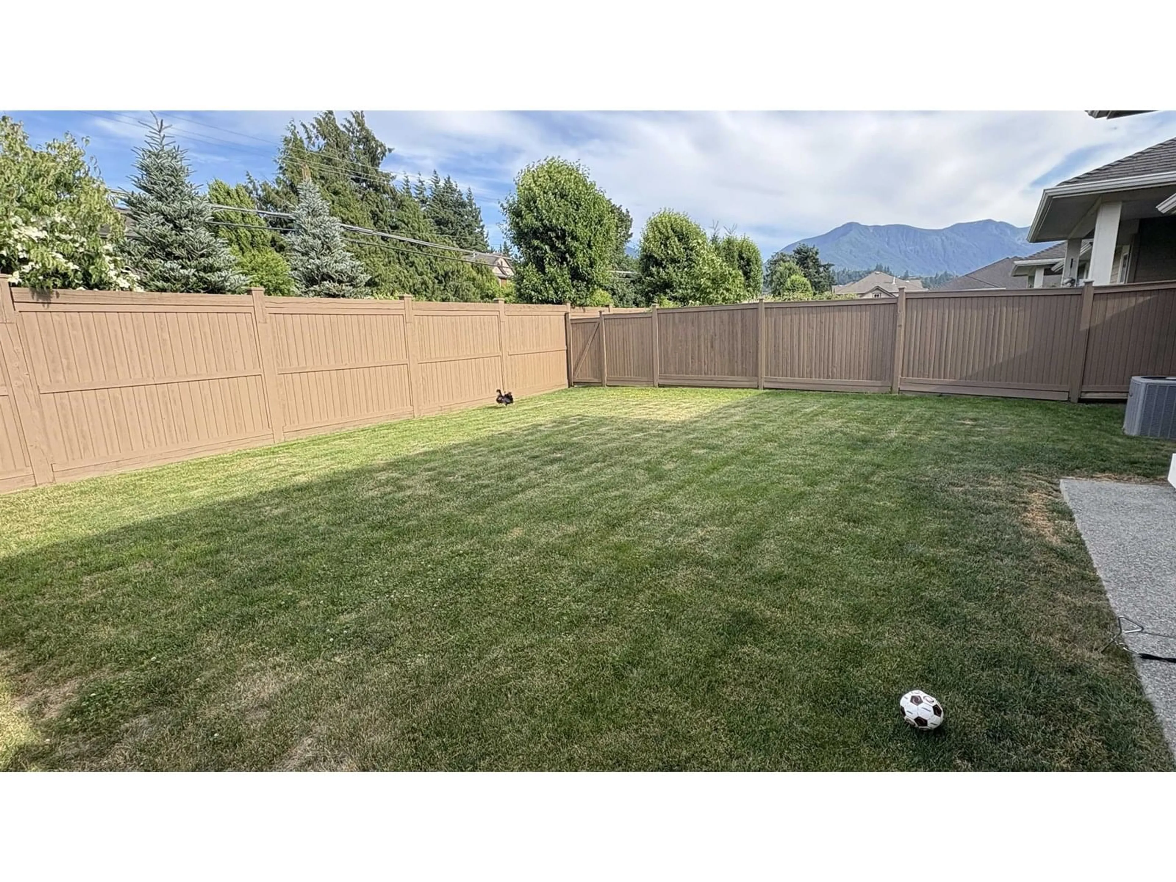 A pic from outside/outdoor area/front of a property/back of a property/a pic from drone, mountain view for 115 - 6540 DOGWOOD DRIVE, Chilliwack British Columbia V2R0W7