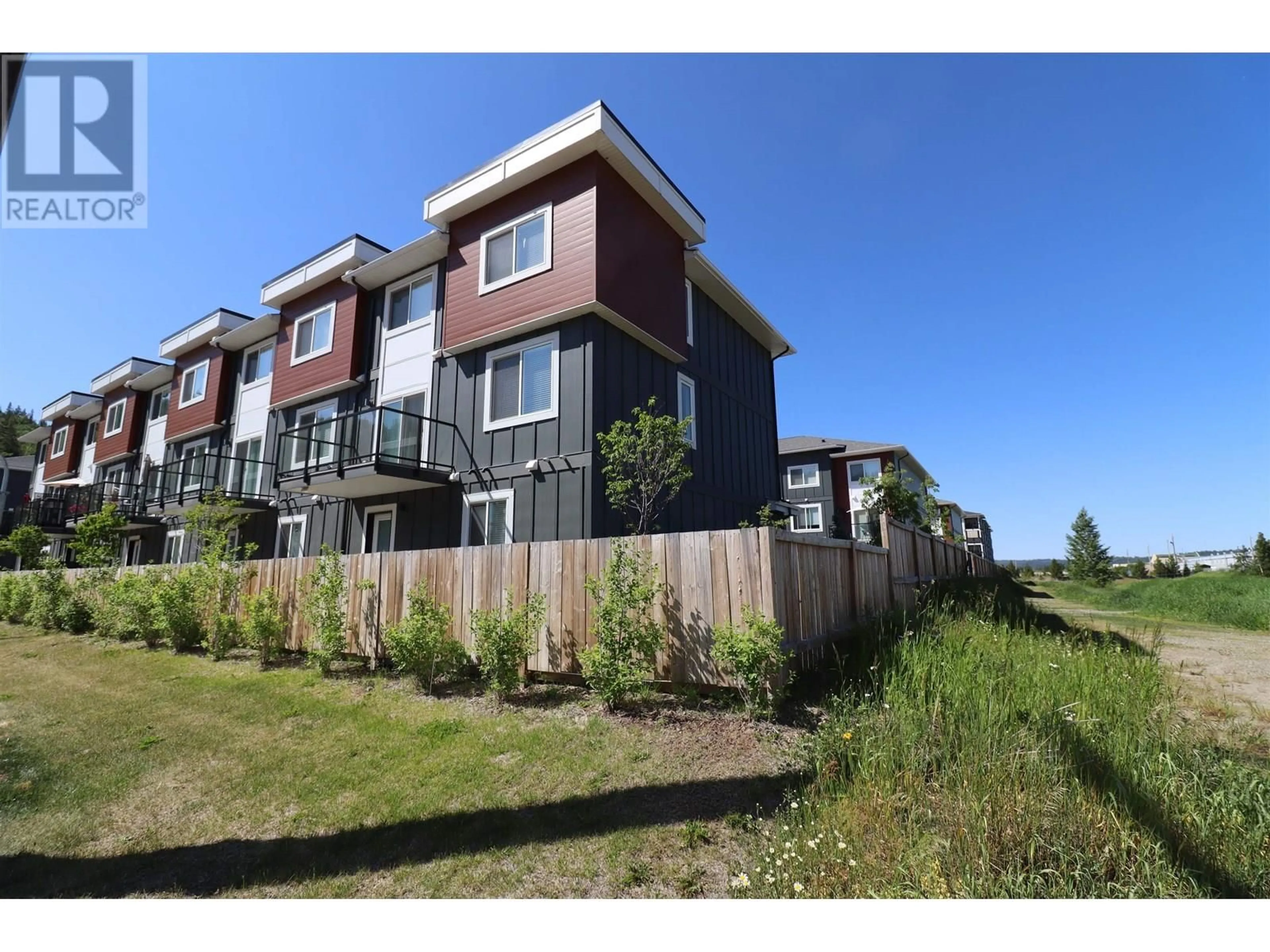 A pic from outside/outdoor area/front of a property/back of a property/a pic from drone, water/lake/river/ocean view for 201 - 4274 22ND AVENUE, Prince George British Columbia V2N0J4