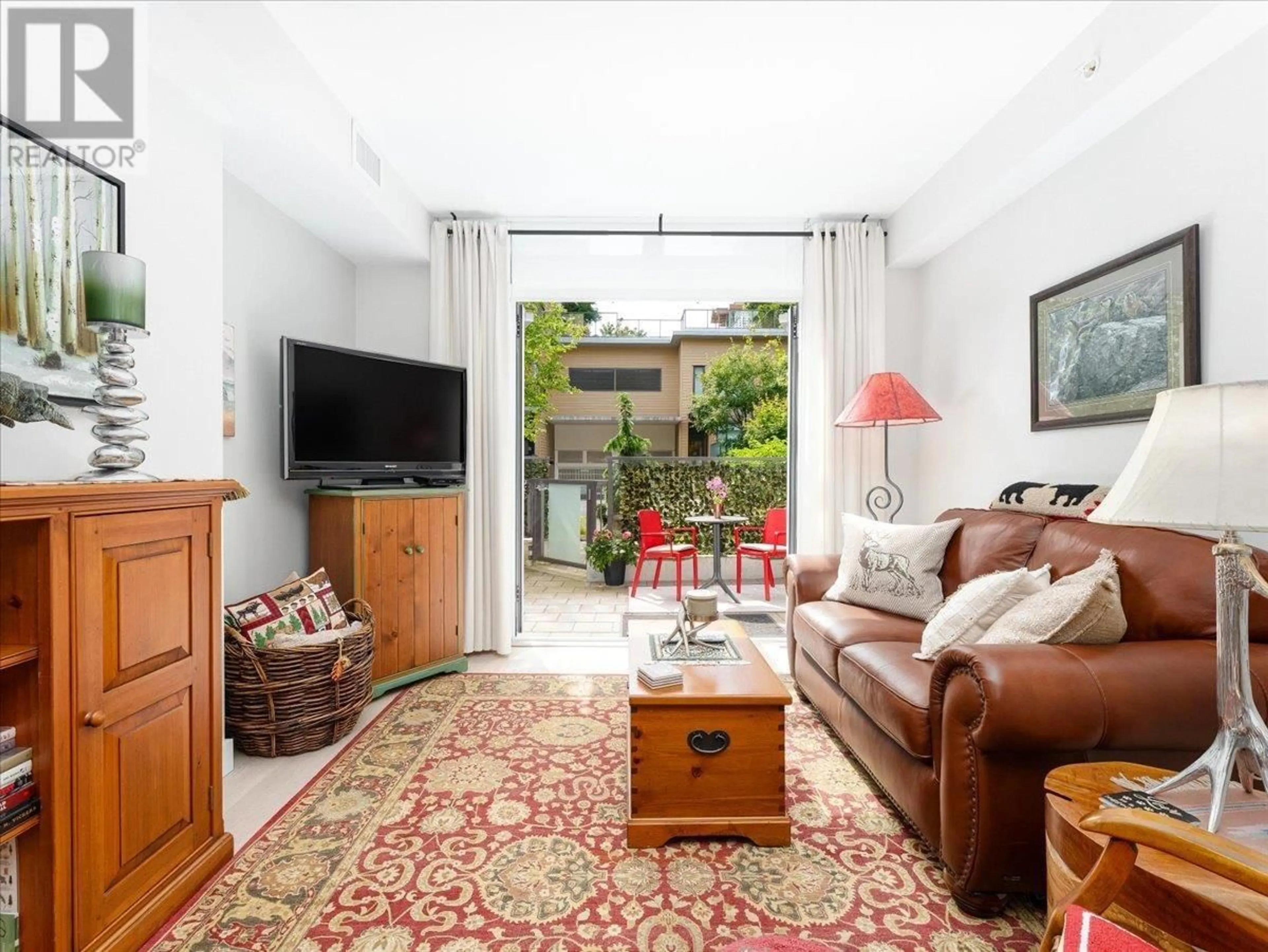 Living room with furniture, unknown for 101 - 2738 LIBRARY LANE, North Vancouver British Columbia V7J0B3