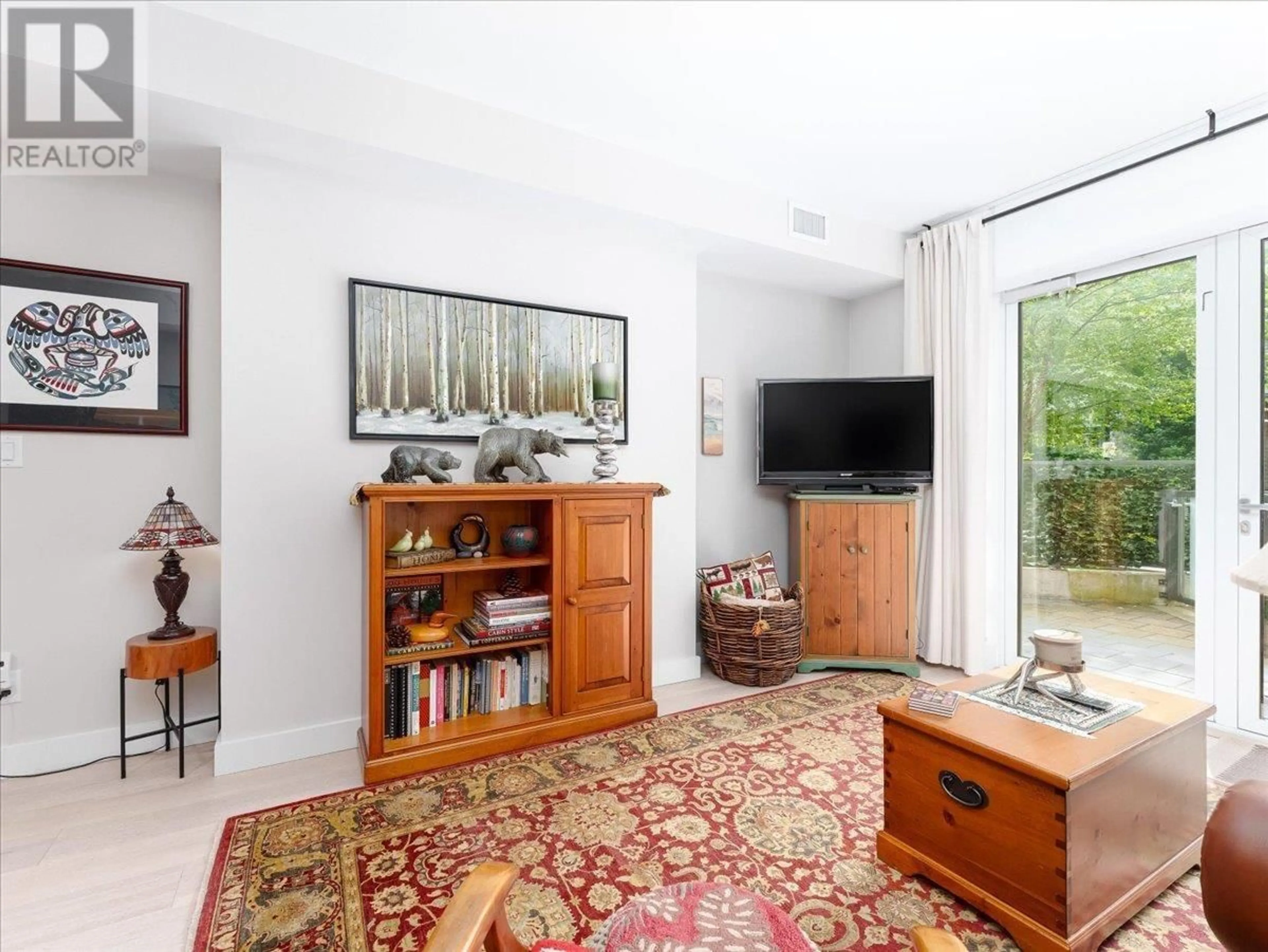 Living room with furniture, unknown for 101 - 2738 LIBRARY LANE, North Vancouver British Columbia V7J0B3