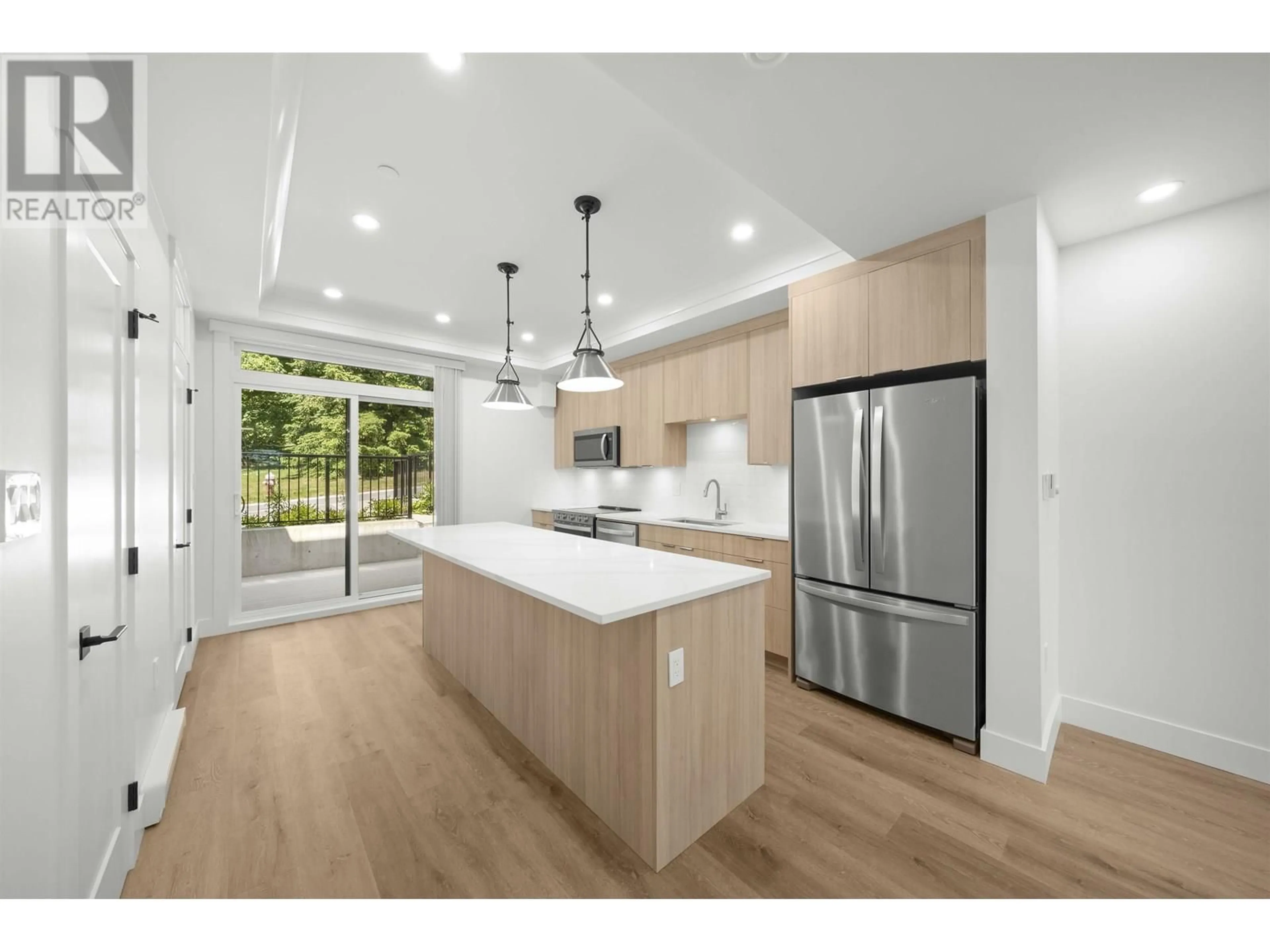 Open concept kitchen, wood/laminate floor for 43 EIGHTH AVENUE, New Westminster British Columbia V3L4J4