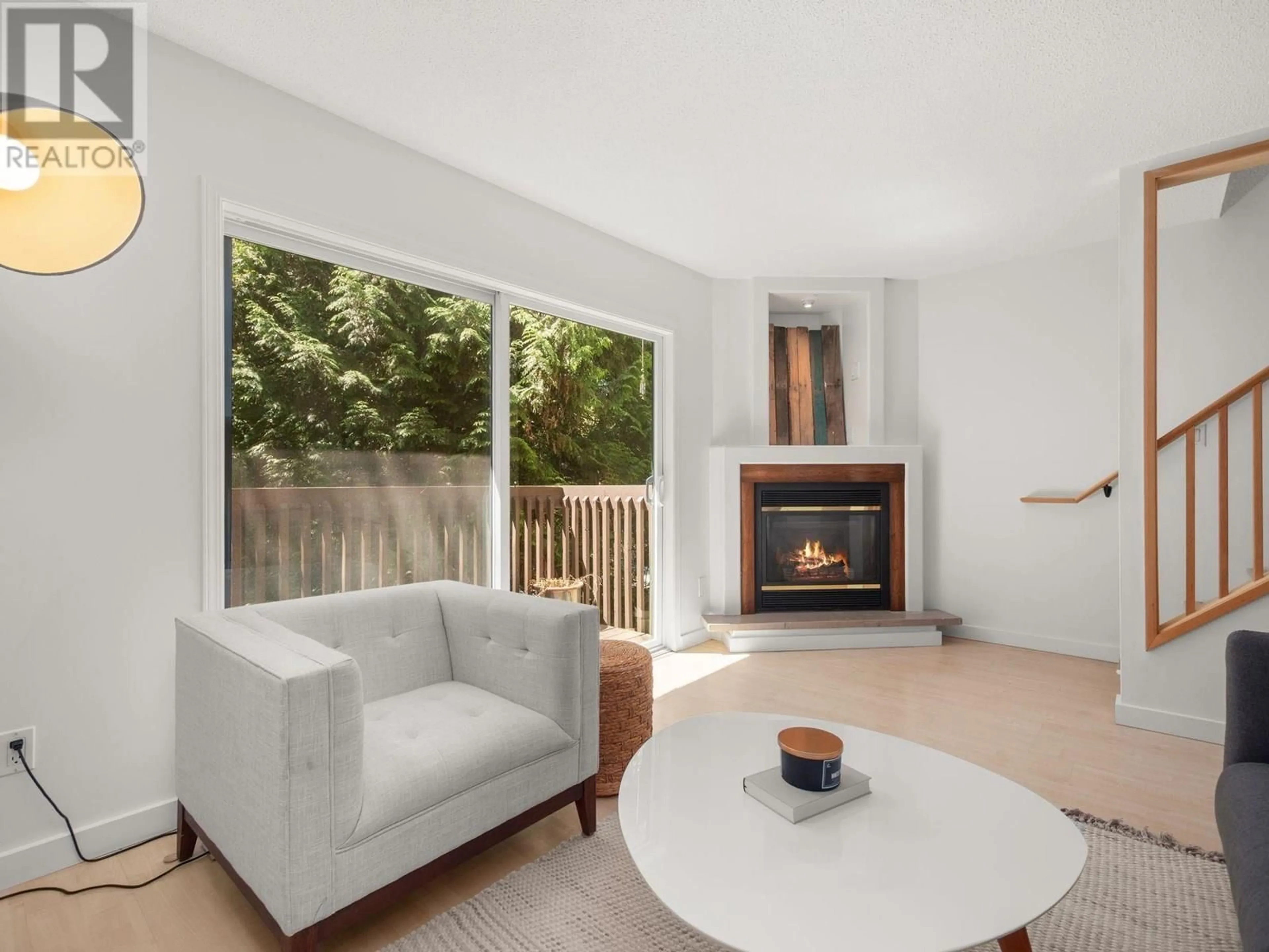 Living room with furniture, wood/laminate floor for 133 - 511 GATENSBURY STREET, Coquitlam British Columbia V3J5E7