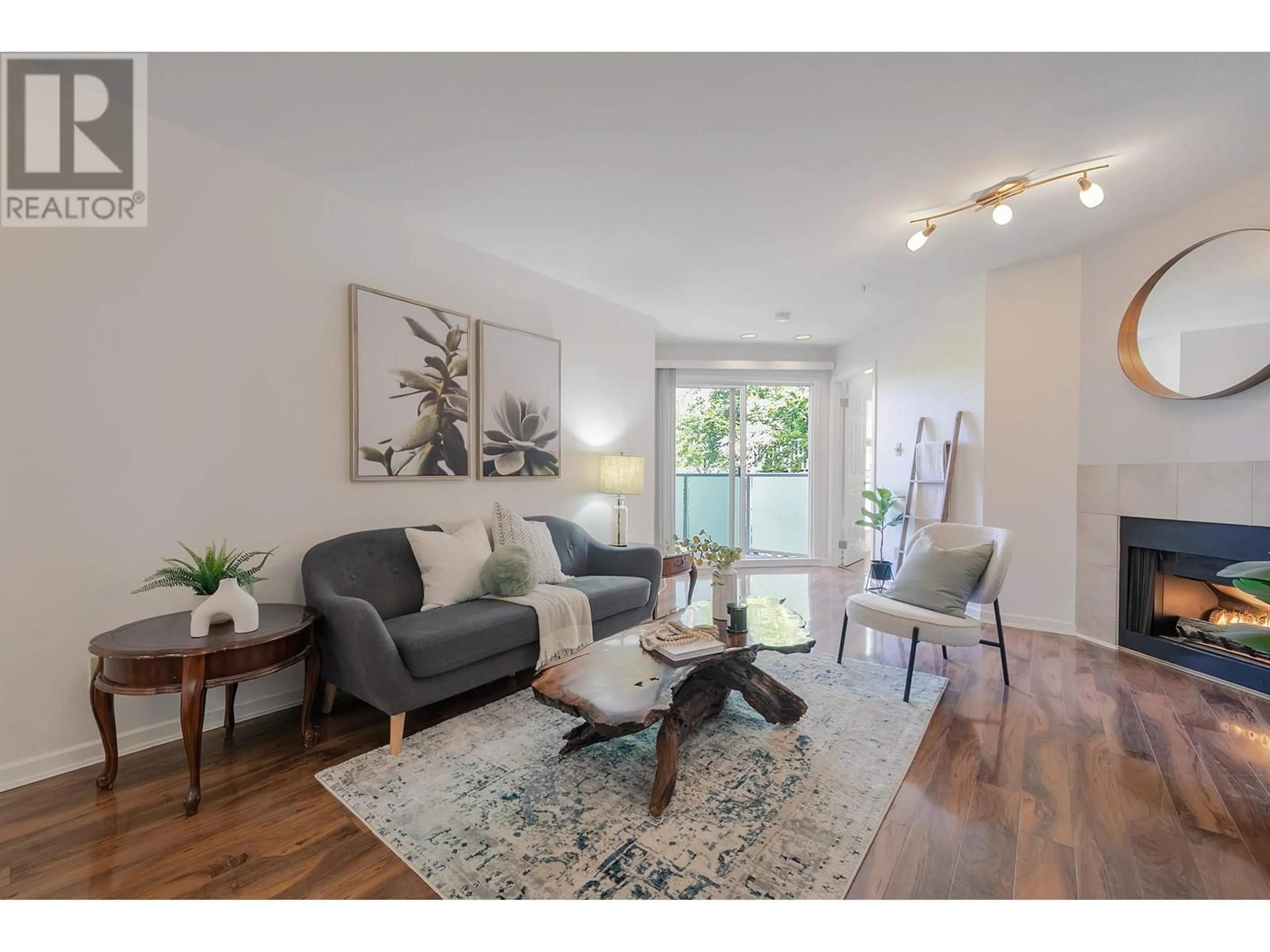 Living room with furniture, wood/laminate floor for 309 - 518 THIRTEENTH STREET, New Westminster British Columbia V3M4L9