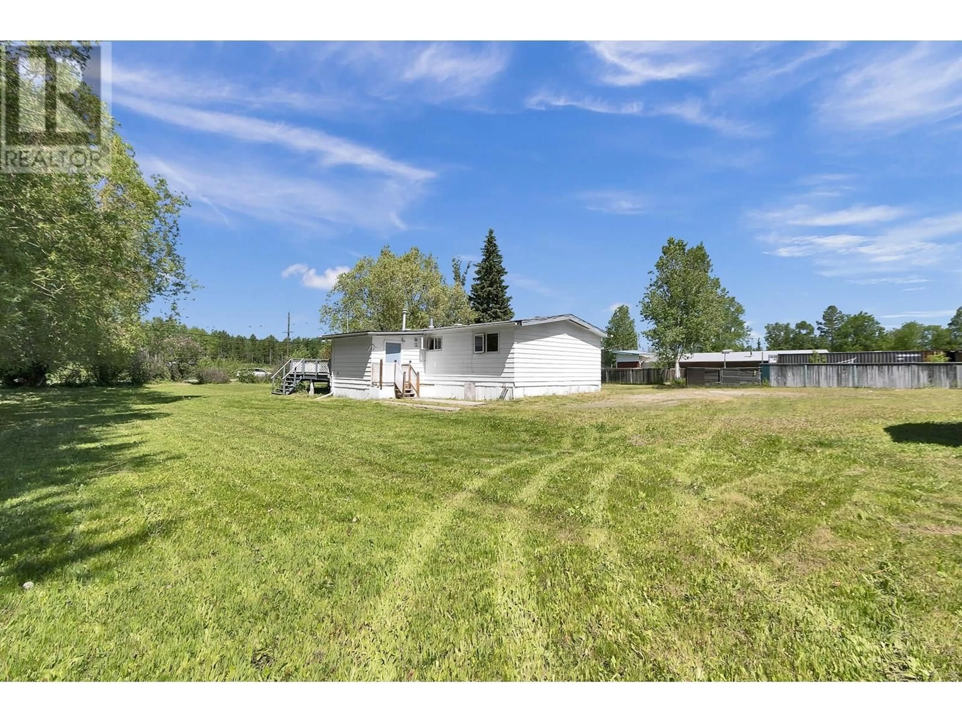 A pic from outside/outdoor area/front of a property/back of a property/a pic from drone, unknown for 7259 HIGHWAY 16, Prince George British Columbia V2N4Y7