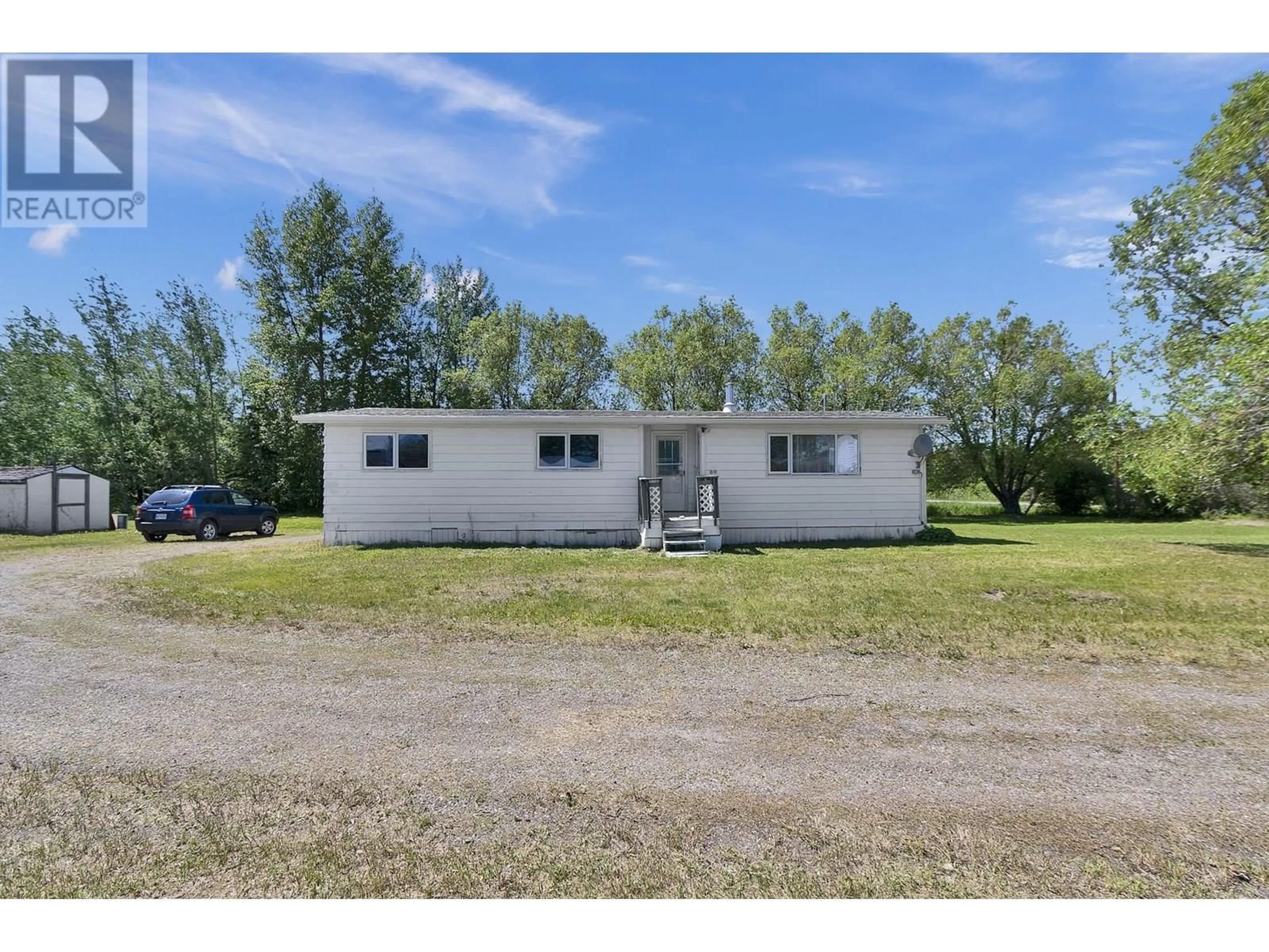 A pic from outside/outdoor area/front of a property/back of a property/a pic from drone, building for 7259 HIGHWAY 16, Prince George British Columbia V2N4Y7
