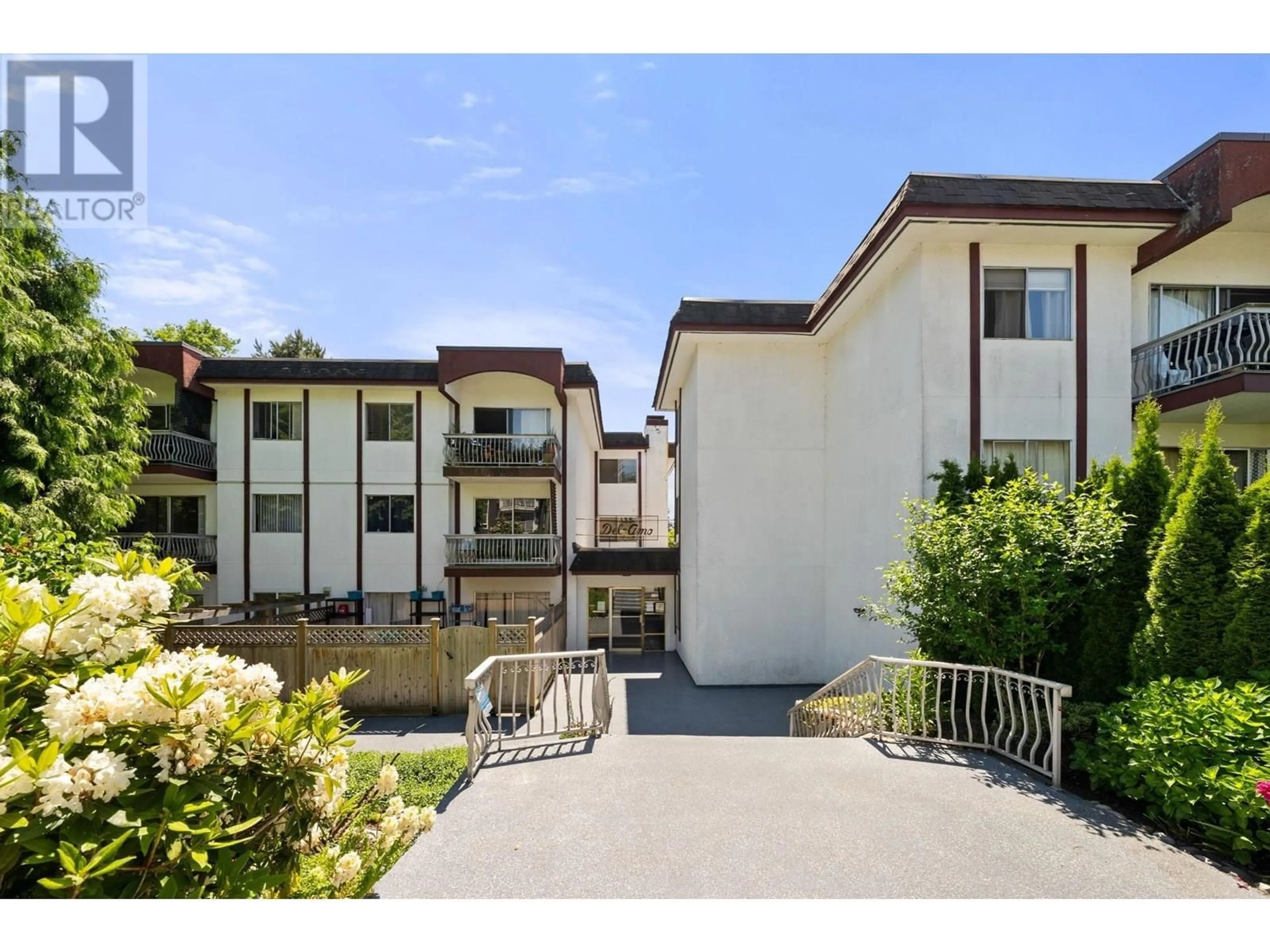 A pic from outside/outdoor area/front of a property/back of a property/a pic from drone, unknown for 102 - 135 21ST STREET, North Vancouver British Columbia V7M1Z2