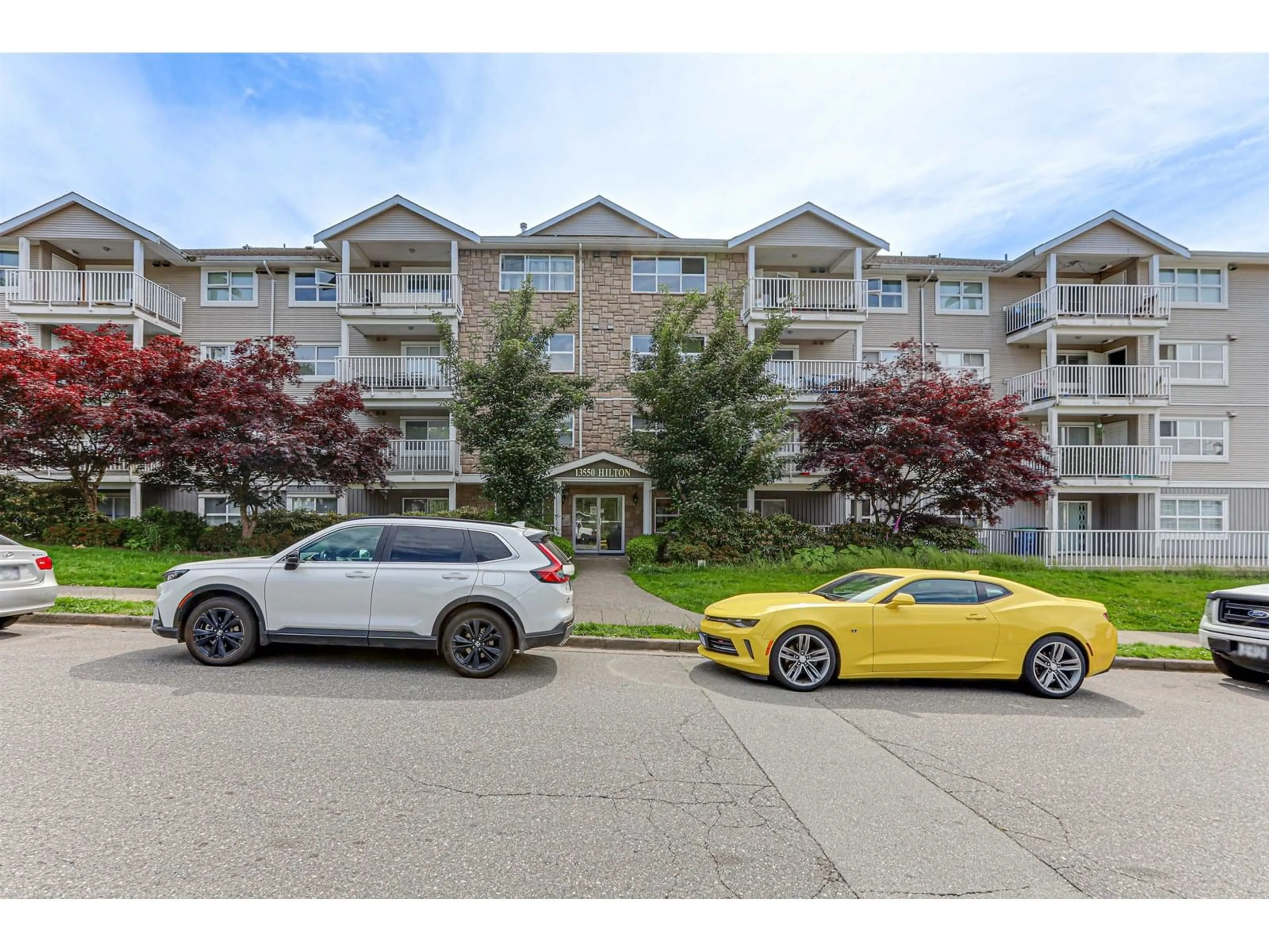 A pic from outside/outdoor area/front of a property/back of a property/a pic from drone, unknown for 205 - 13550 HILTON, Surrey British Columbia V3R5J4