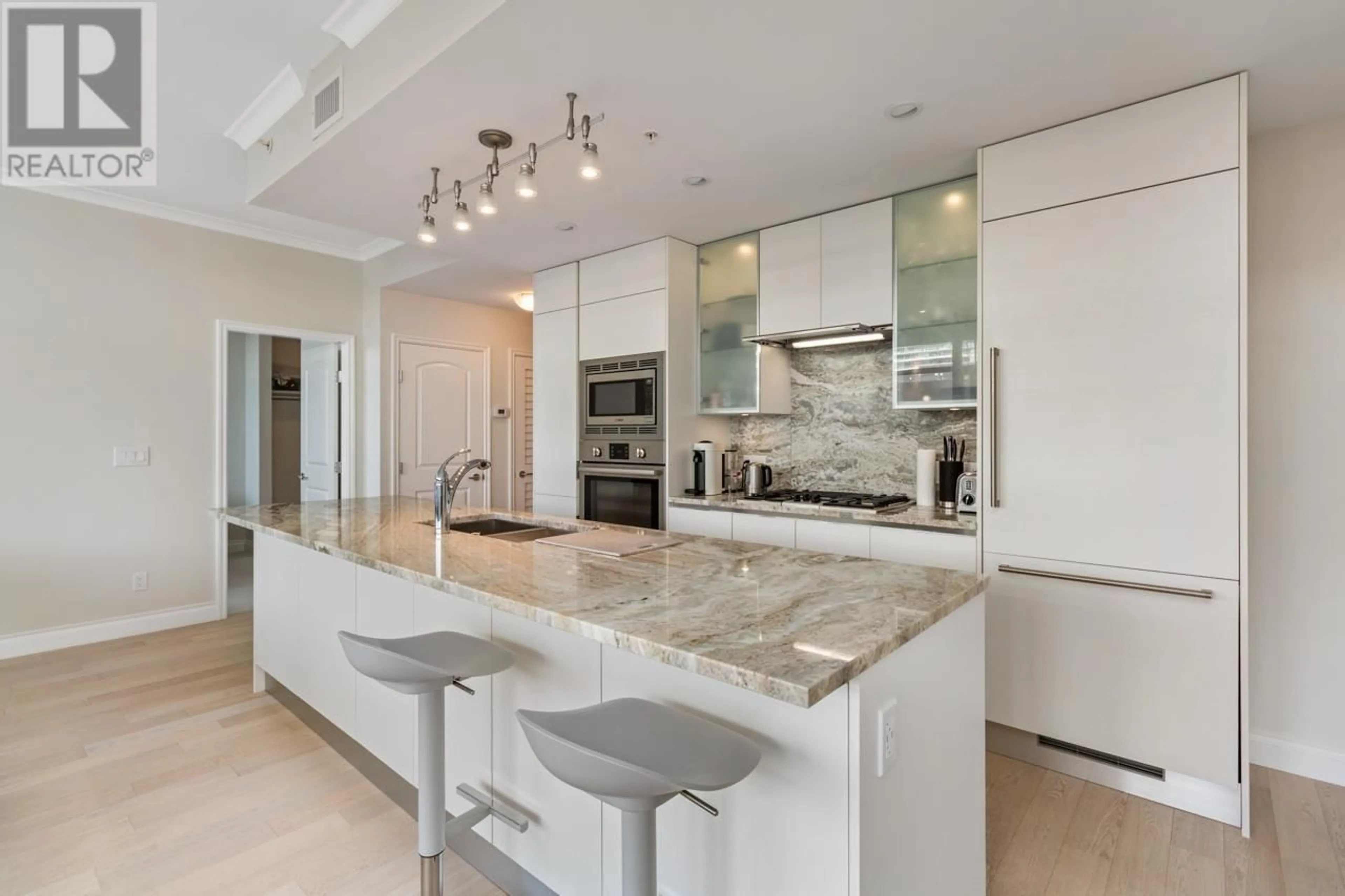 Contemporary kitchen, ceramic/tile floor for 506 - 175 VICTORY SHIP WAY, North Vancouver British Columbia V7L0G1