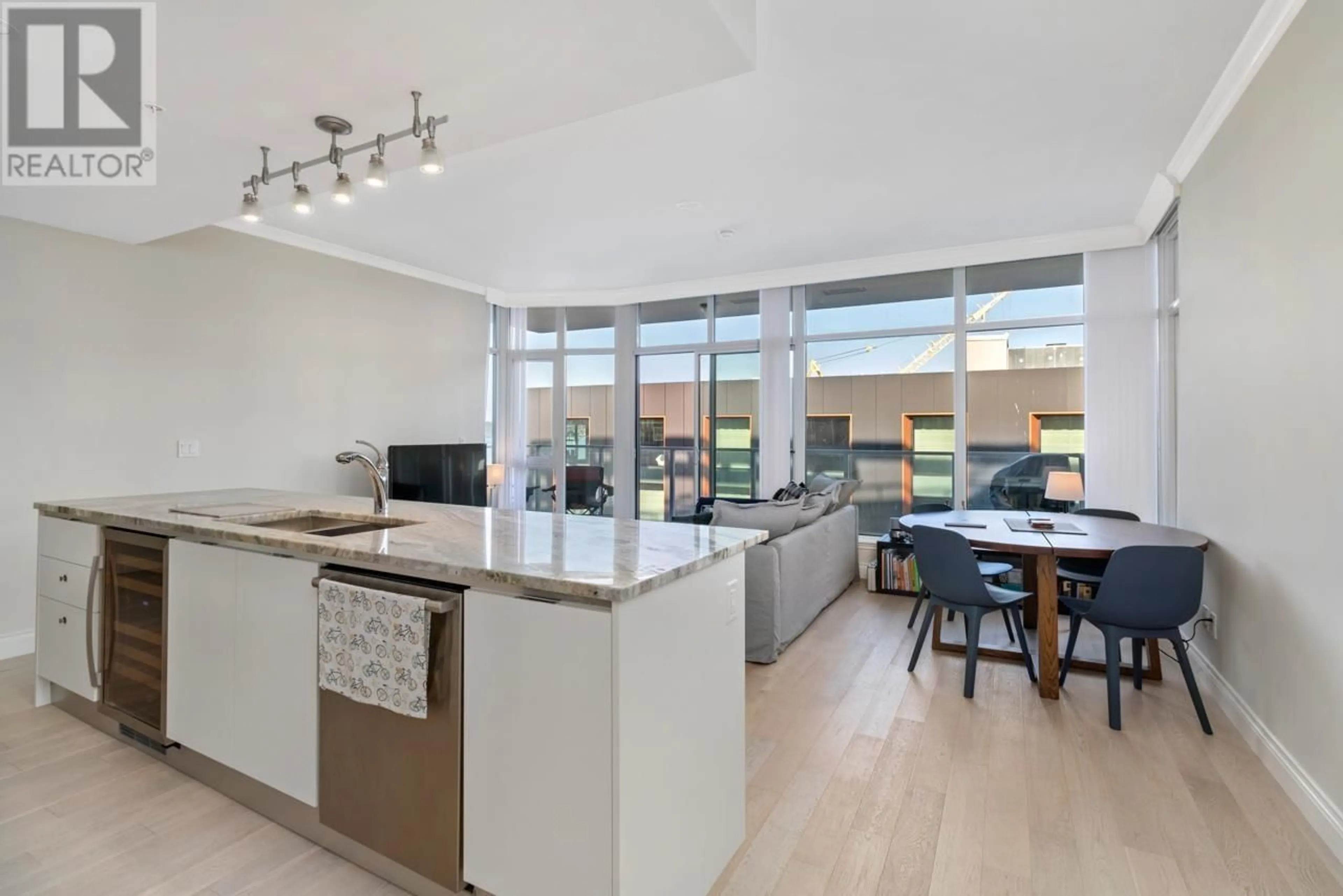Open concept kitchen, unknown for 506 - 175 VICTORY SHIP WAY, North Vancouver British Columbia V7L0G1
