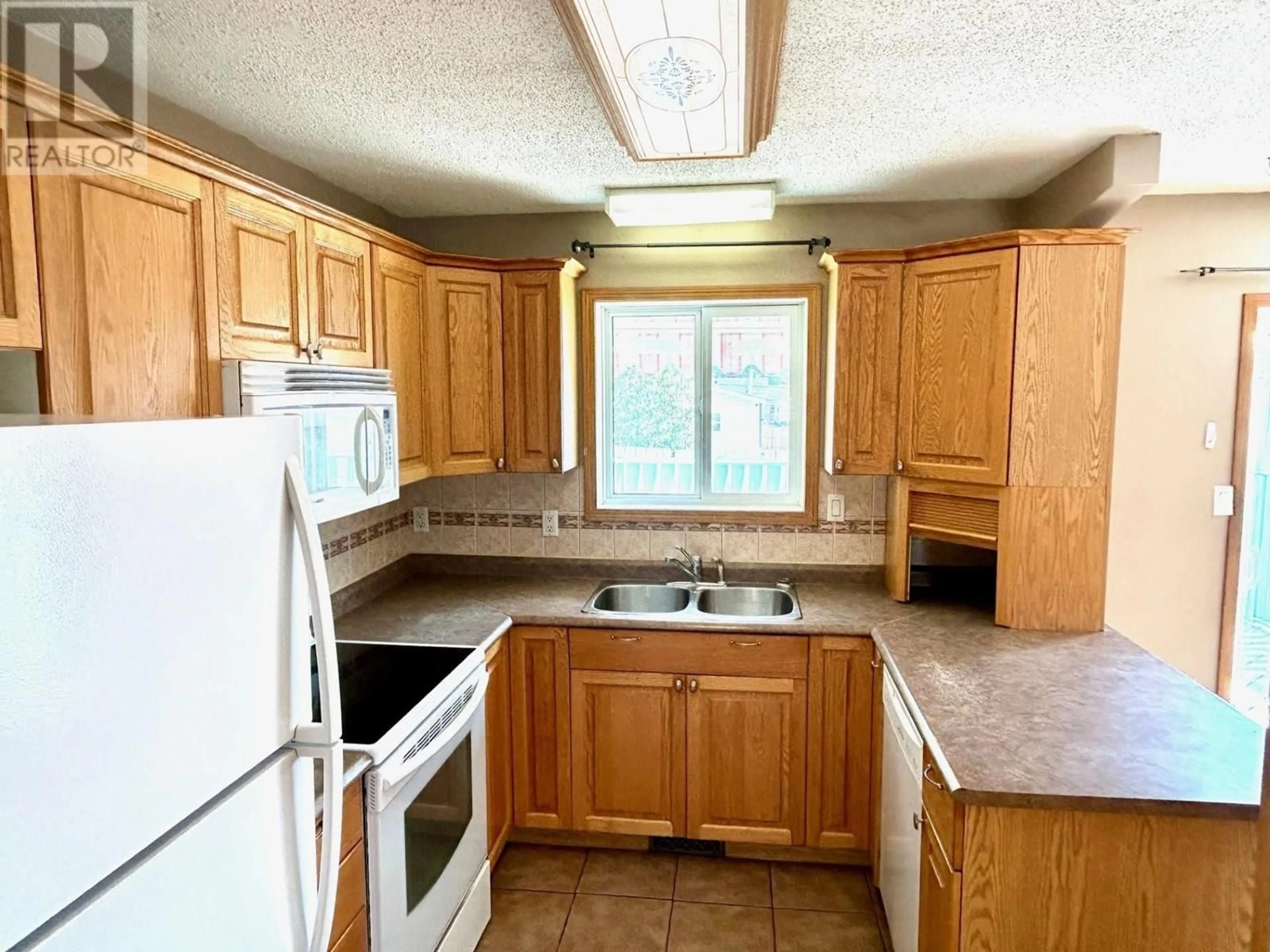 Standard kitchen, unknown for 5212 ASPEN CRESCENT, Fort Nelson British Columbia V0C1R0