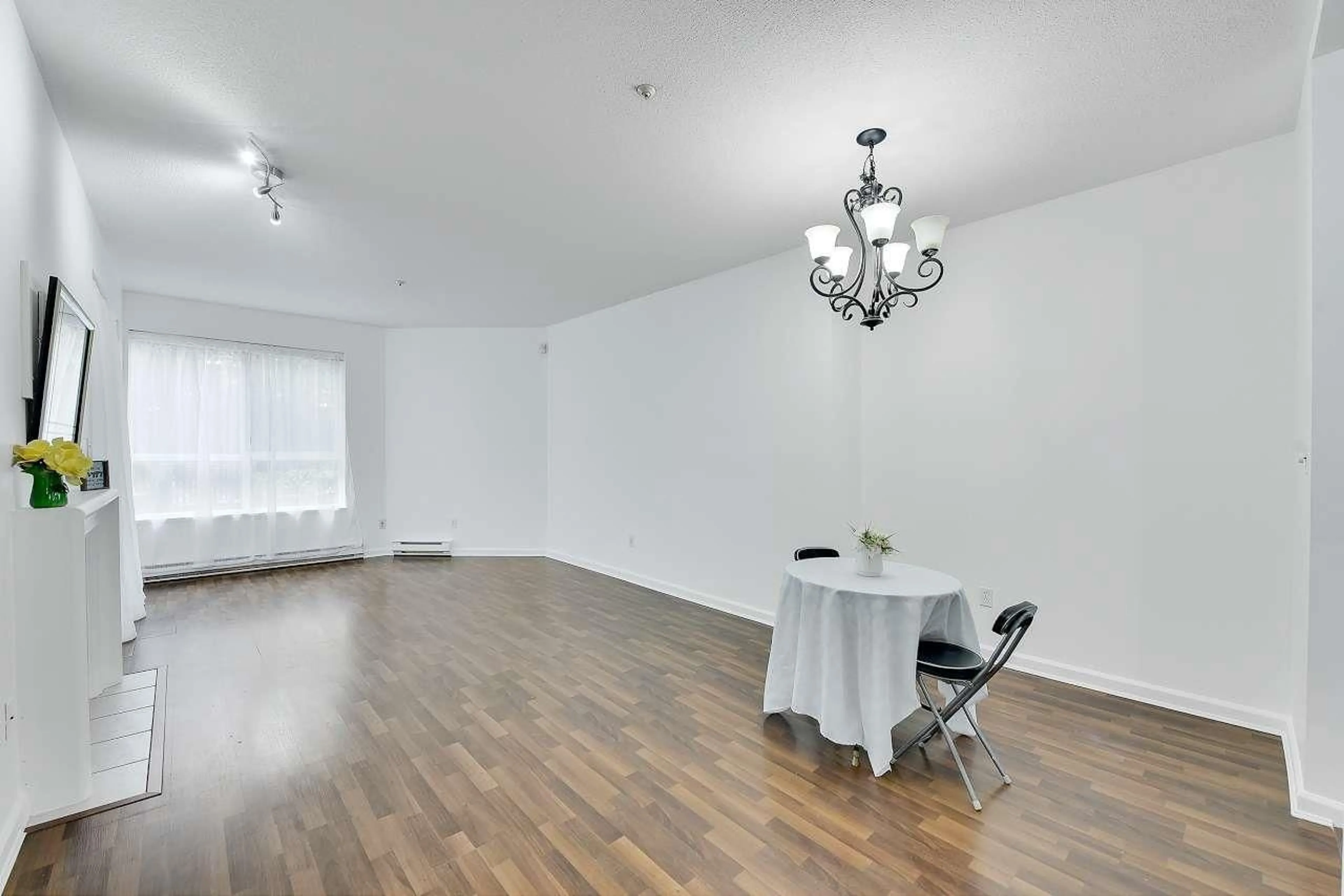 Dining room, wood/laminate floor for 104 - 8139 121A, Surrey British Columbia V3W0Z2