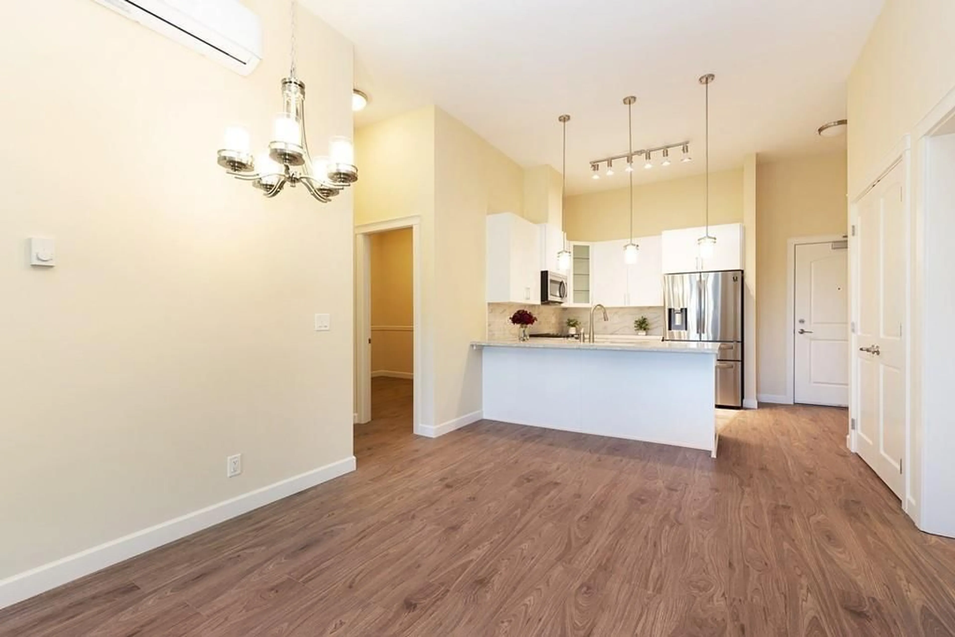 Open concept kitchen, wood/laminate floor for 612 - 8558 202B, Langley British Columbia V2Y3L4